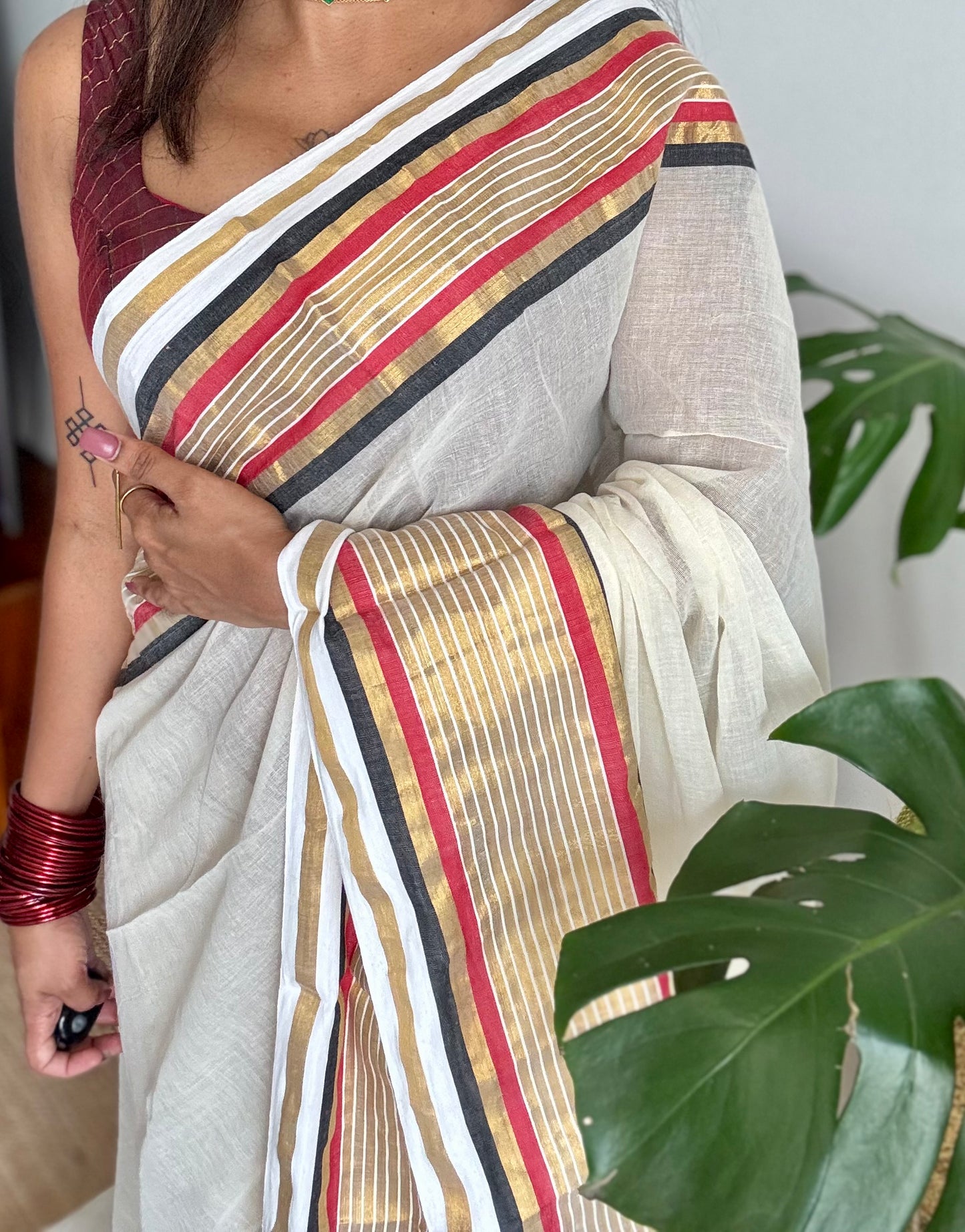 Ivory mul saree, red, black and gold striped border - YCIEON15
