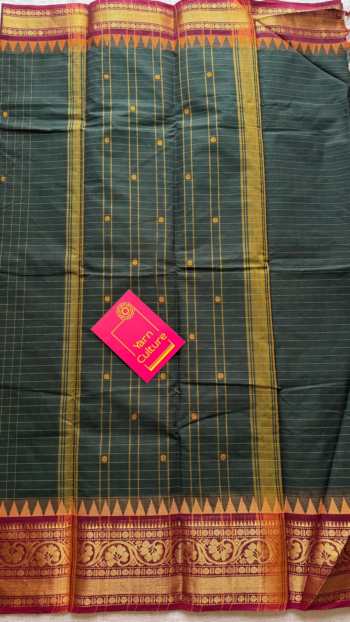 Dark green Kanchi cotton saree with checks, woven buttas and red zari border - YCCOTNCCFE161
