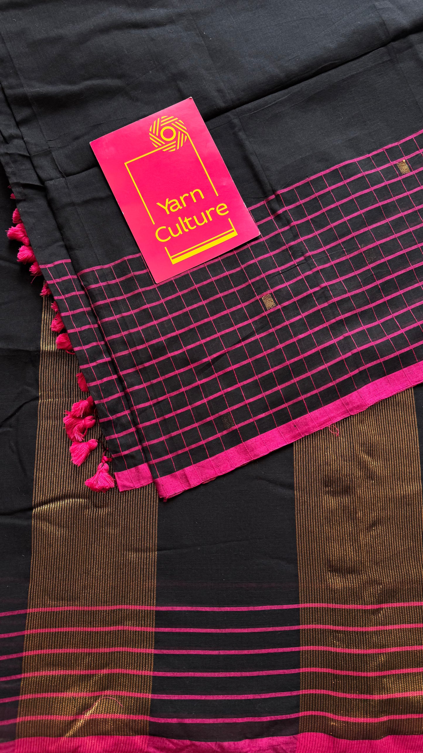 Black handloom mul saree with pink checkered borders and antique gold buttas - YCBCMCFE385