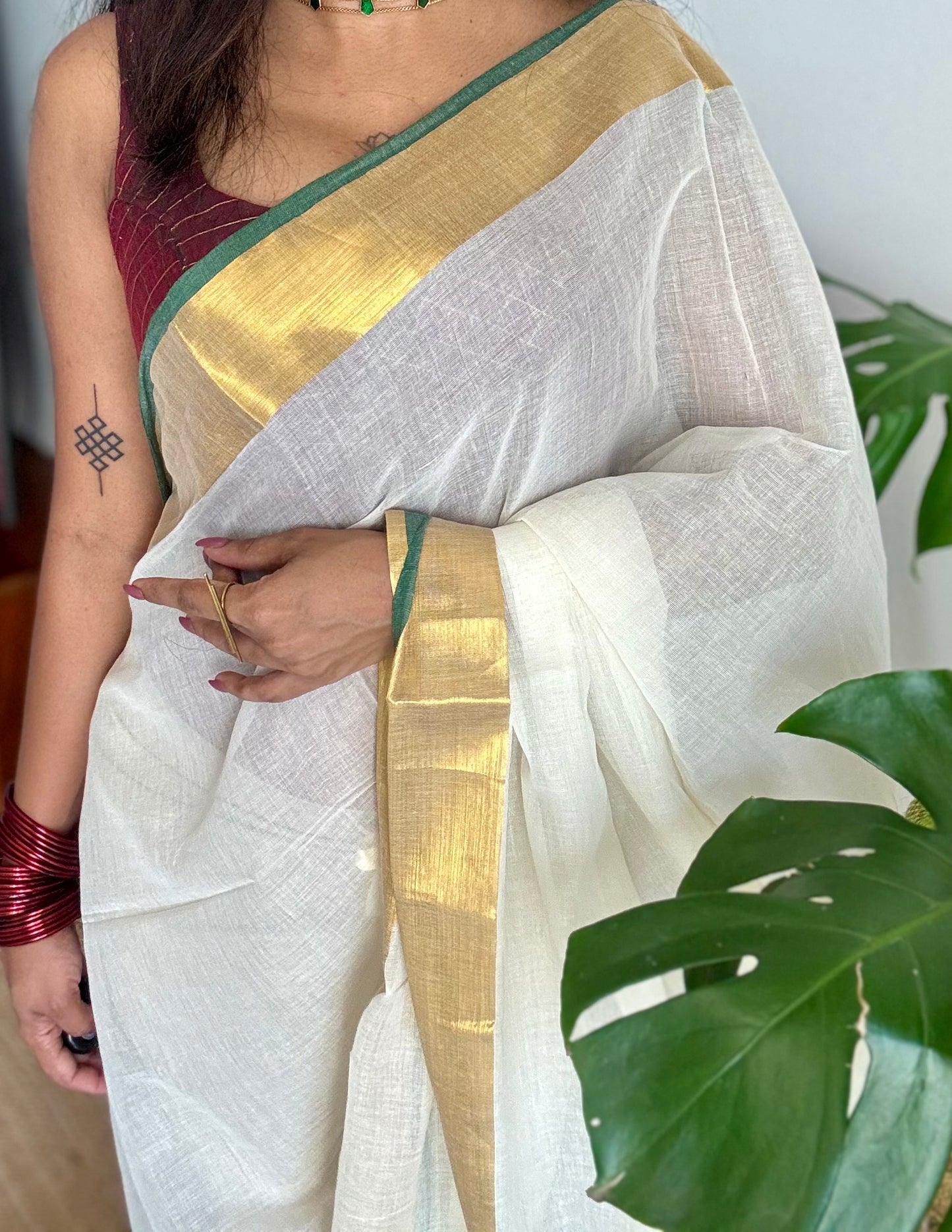 Ivory mul saree, green and gold border -YCIEON16