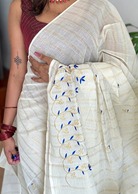 Ivory and gold soft cotton saree, blue floral vine embroidery  - YCIEON55
