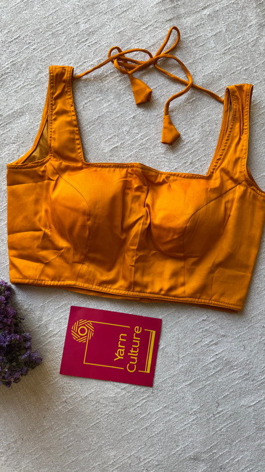 Mustard yellow sleeveless cotton silk stitched blouse, back open, padded - YCSESBP110