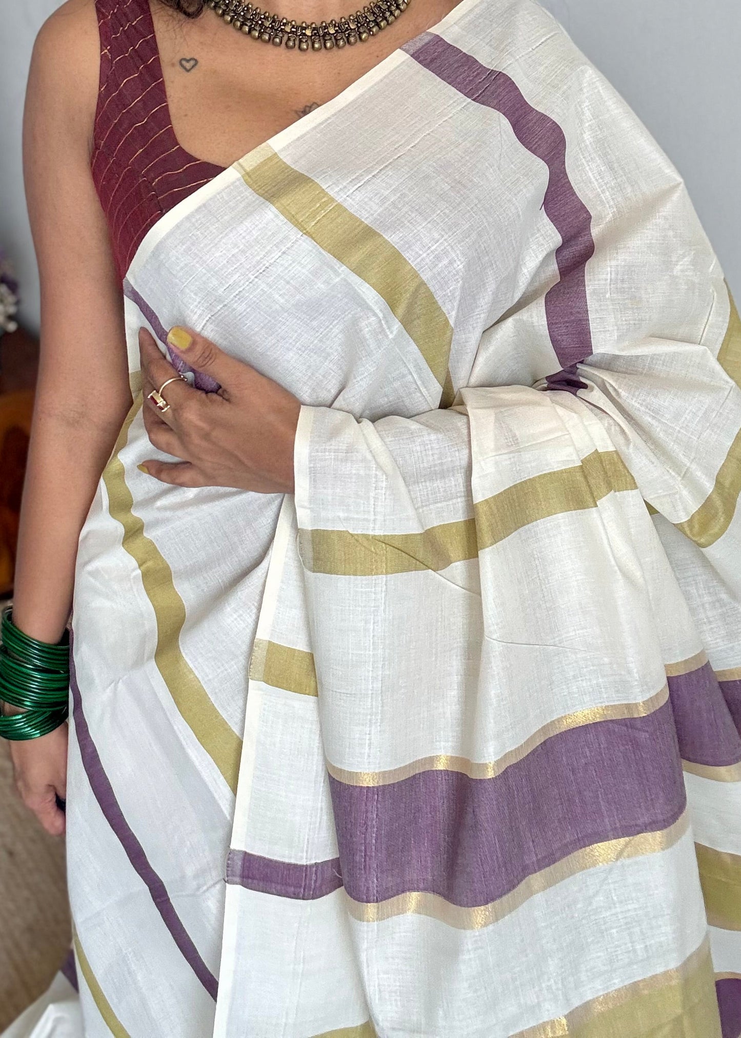 Ivory Kerala cotton saree with purple and green stripes - YCIEKCFE306