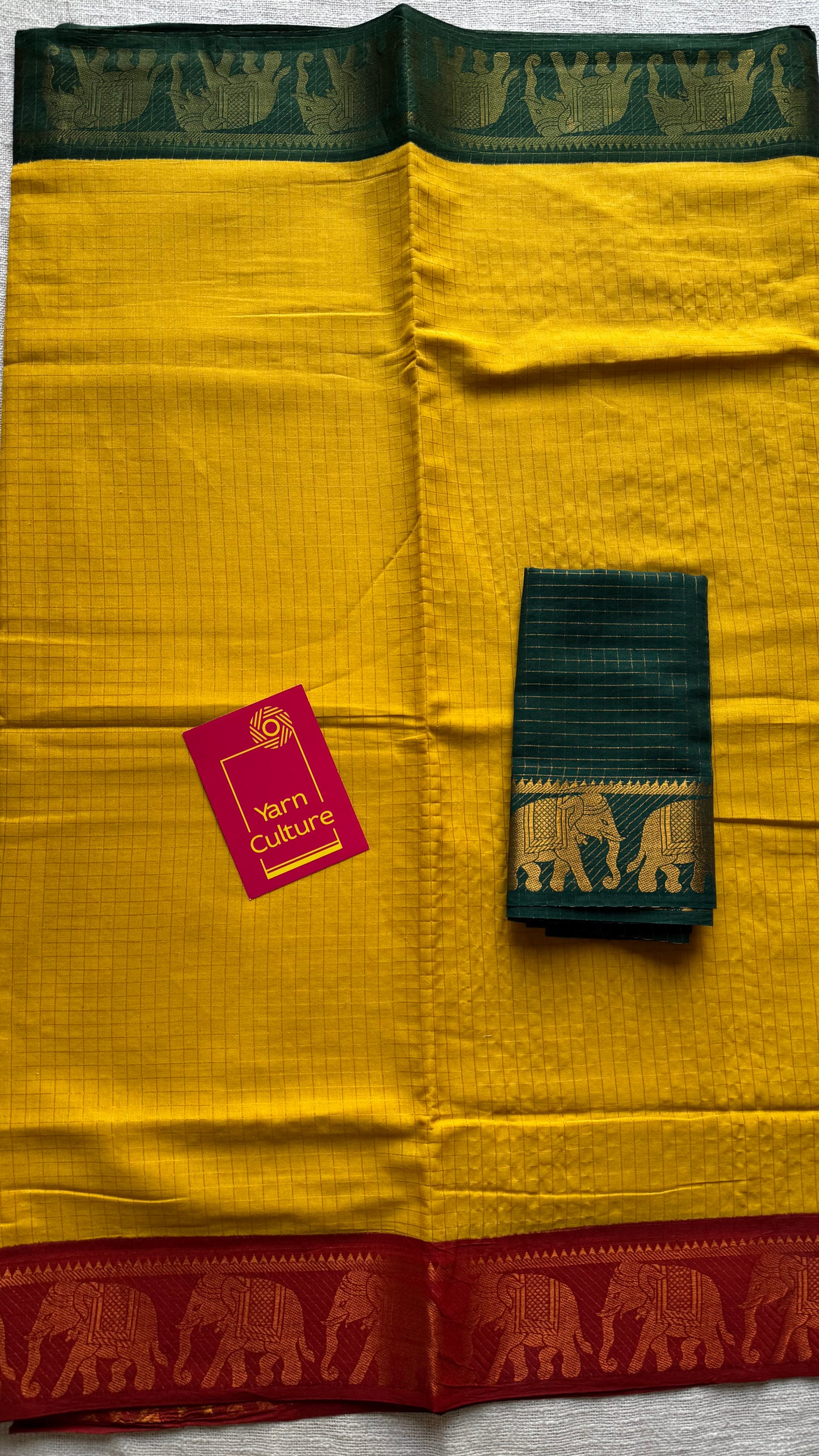 Sungudi cotton checks, yellow base, red and dark green border with elephant motifs, soft cotton - YCCOTNGJJA171