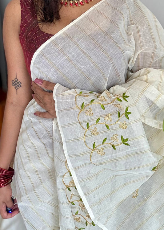 Ivory and gold soft cotton saree, light green floral vine embroidery - YCIEON59