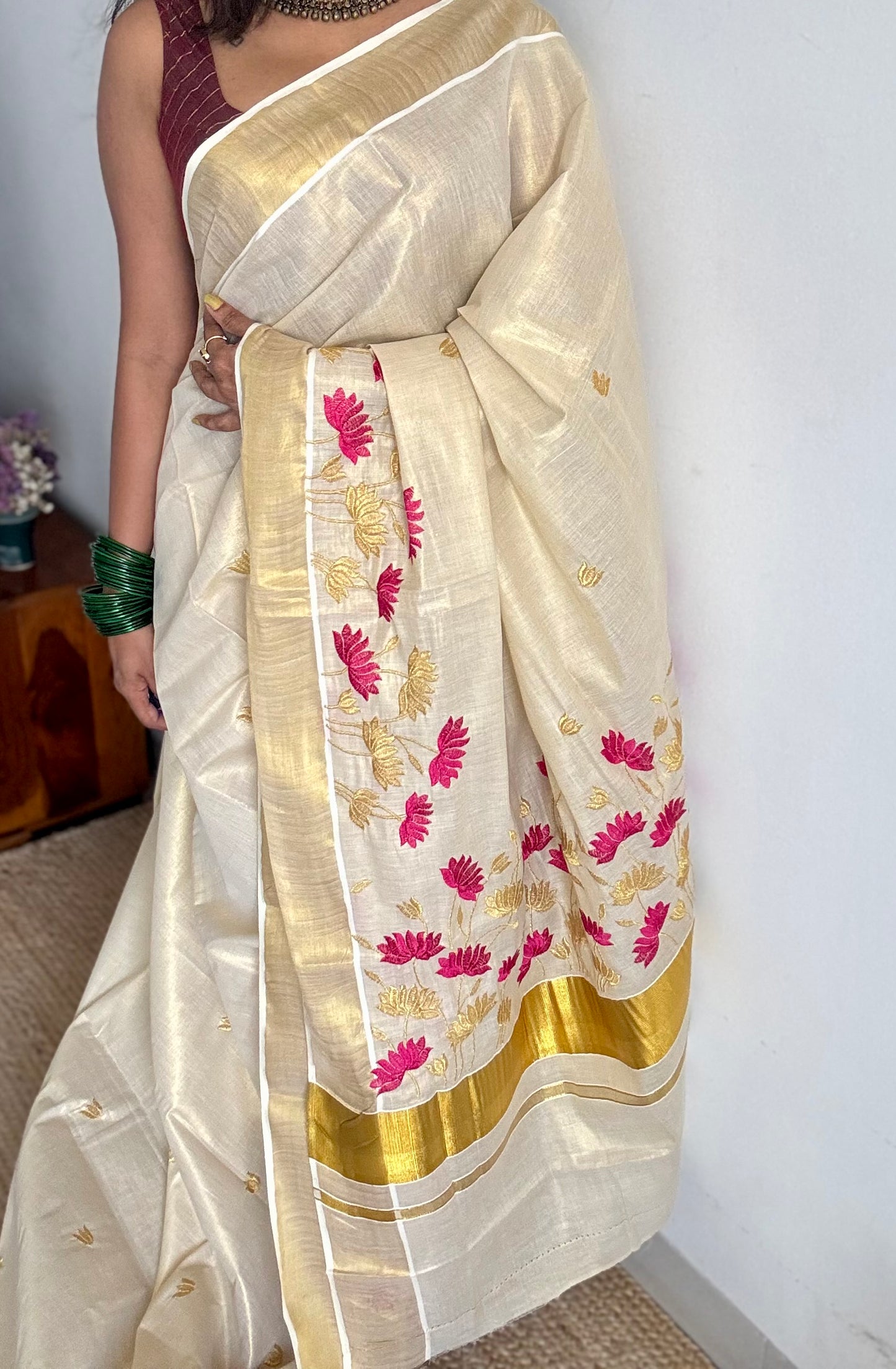 Ivory and gold tissue kerala cotton saree with hot pink and gold lotus embroidery - YCIEKCFE315