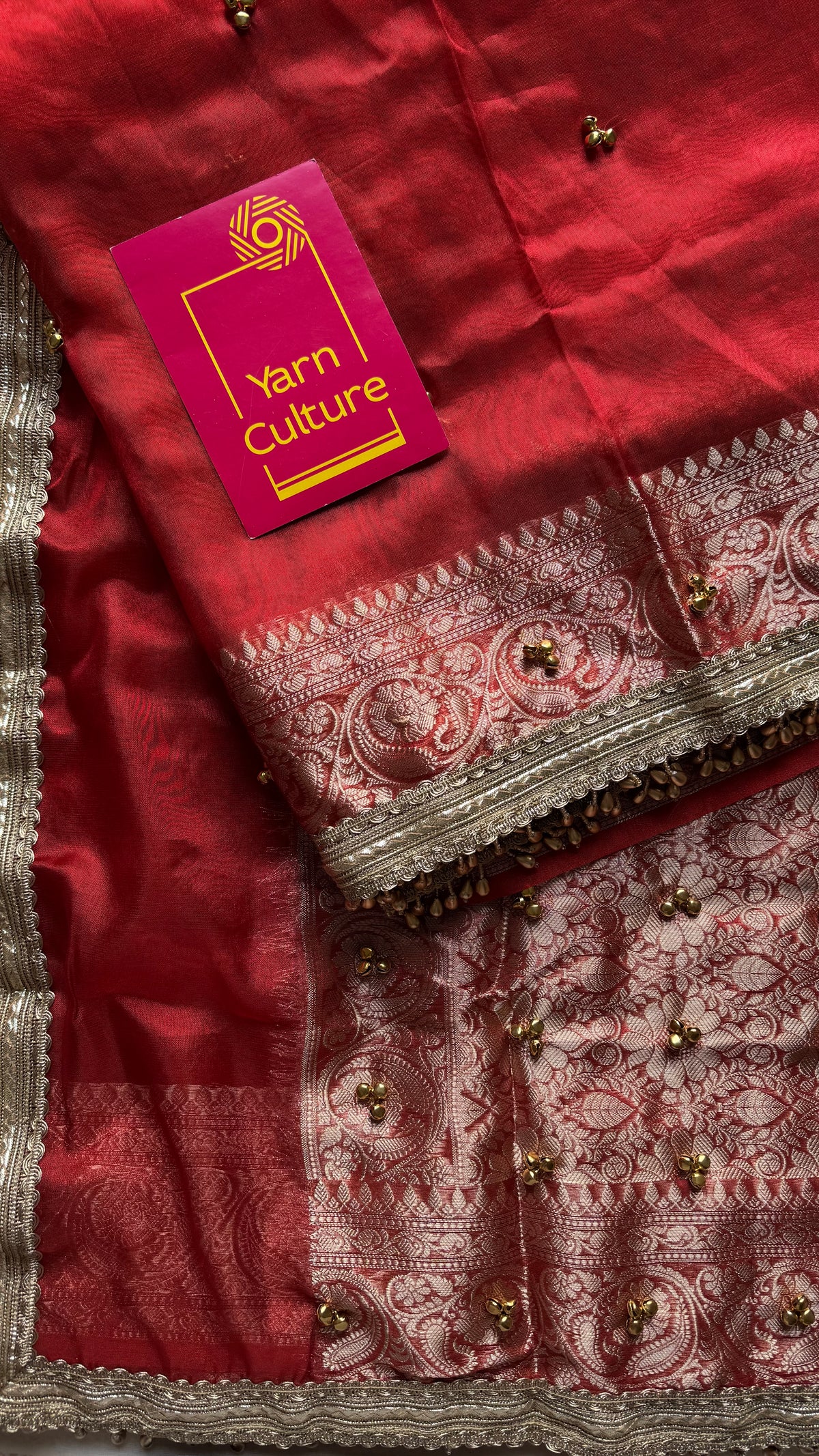 Red gold tissue Banarasi saree with ghungroo embellishments and beaded lace zari border - YCBLTOC69