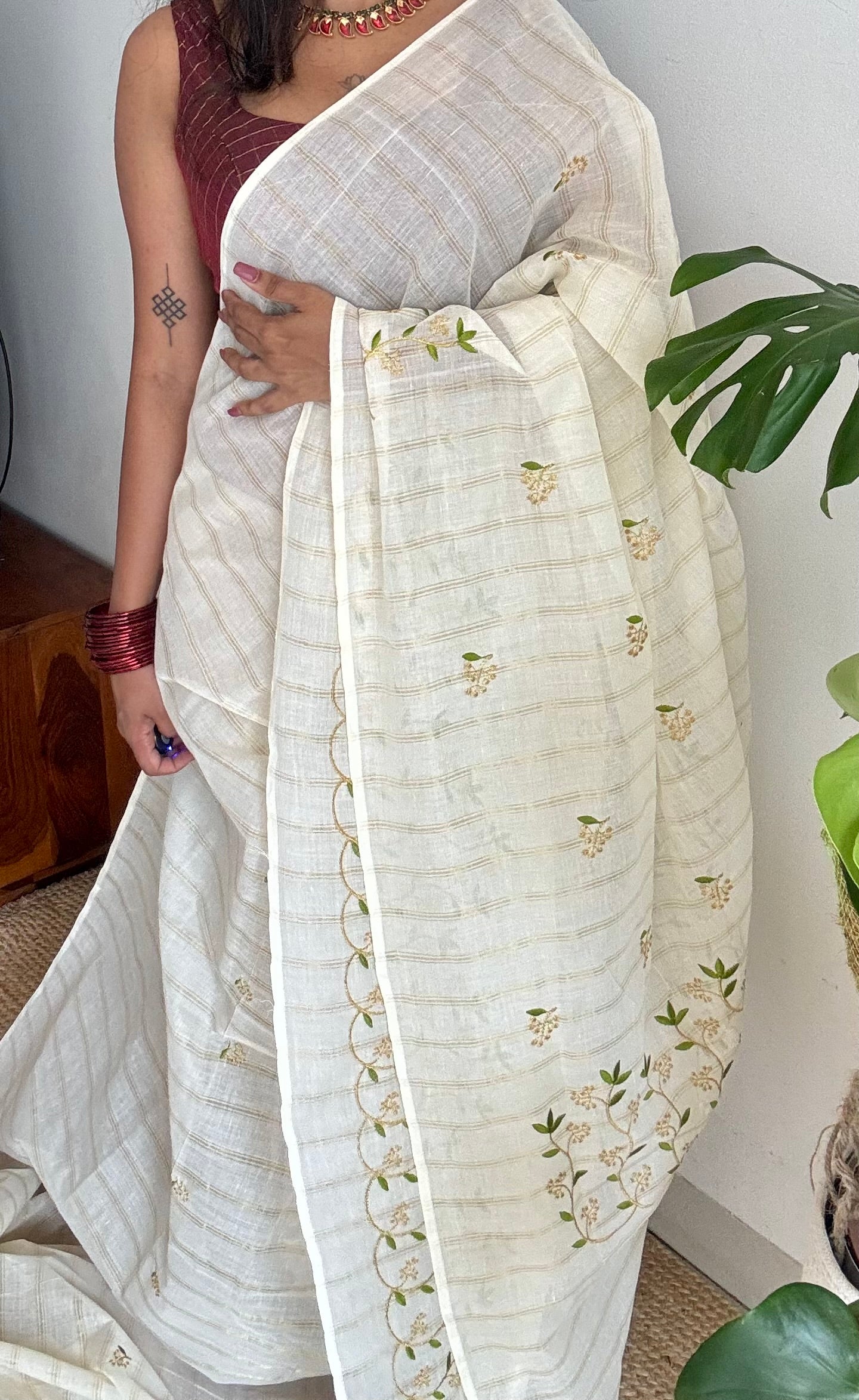 Ivory and gold soft cotton saree, light green floral vine embroidery - YCIEON59