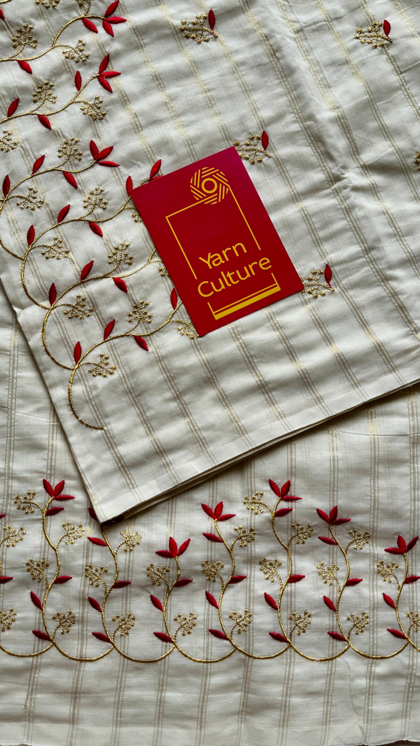 Ivory and gold soft cotton saree, red floral vine embroidery - YCIEON60