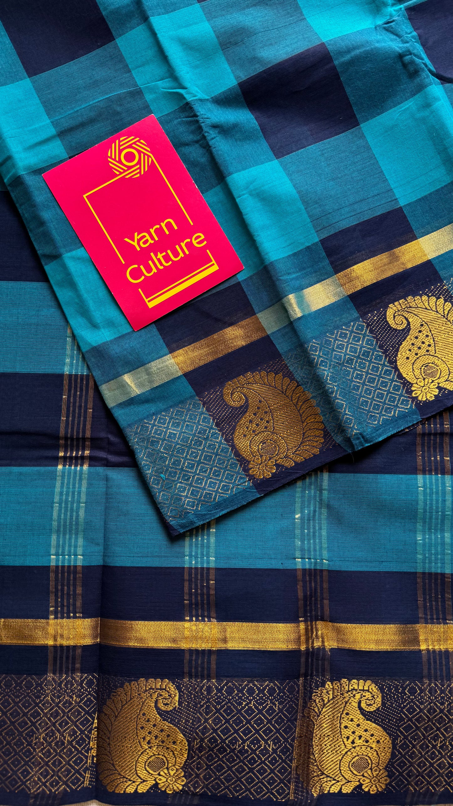 Chettinad cotton saree with sky blue and navy checks, paisley motif border - YCCOTNAP62