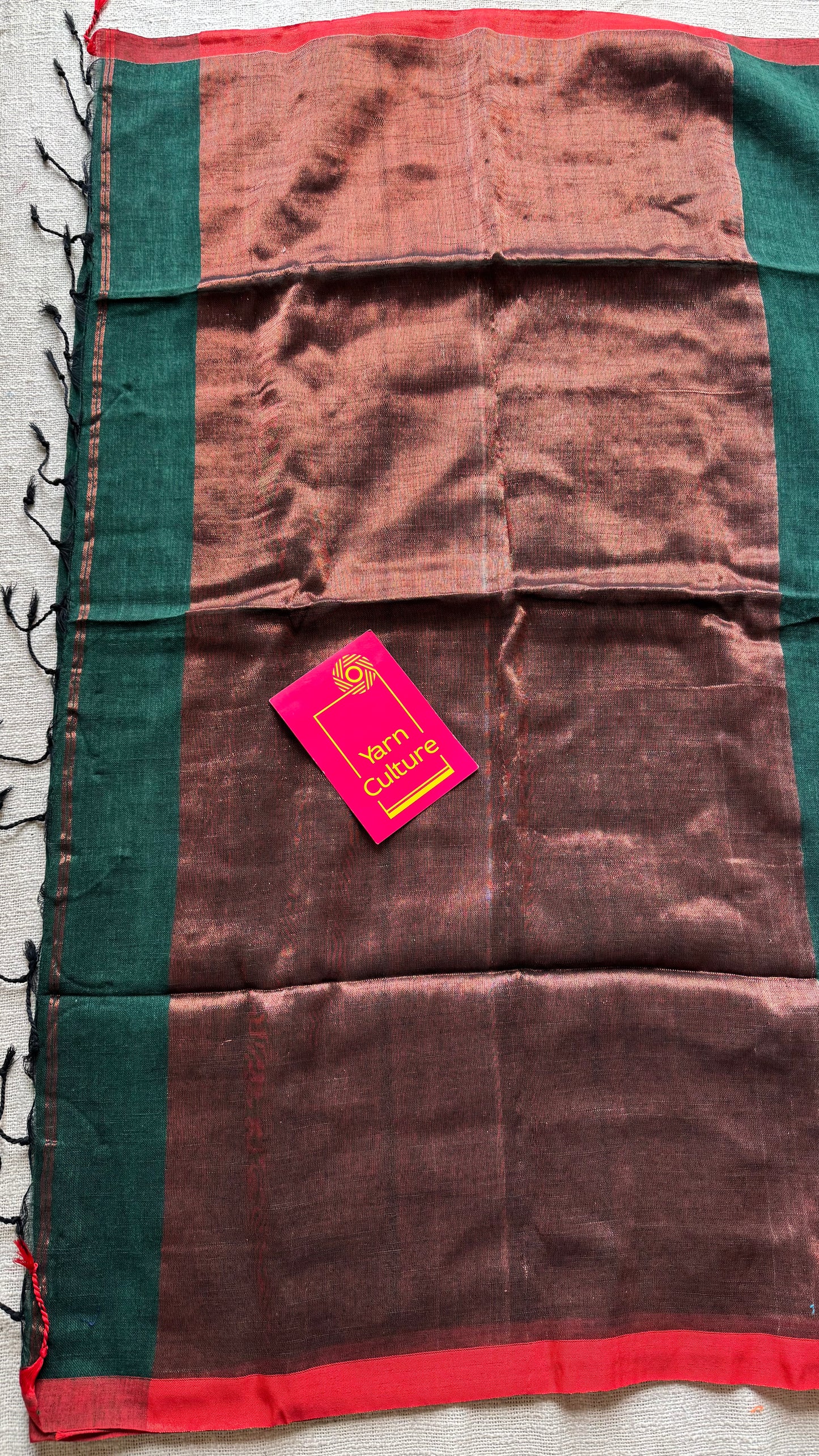 Dark green plain linen by cotton saree with copper zari pallu - YCBCLCFE397