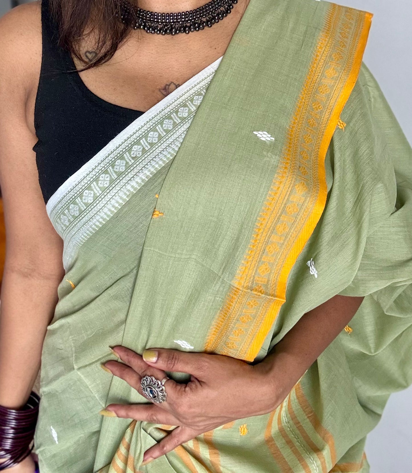 Dhonekhali handloom soft cotton saree, sage green with yellow and white woven buttas and border - YCBCDFE260