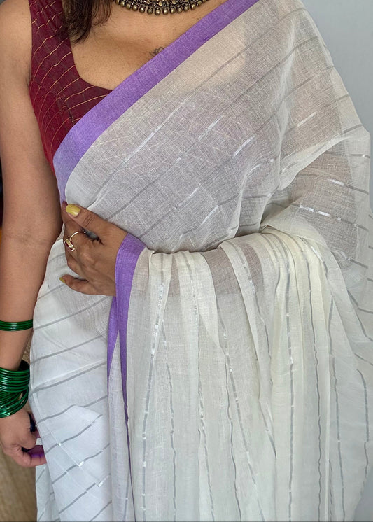 Ivory mul saree with silver zari stripes and purple border - YCBCMCFE288