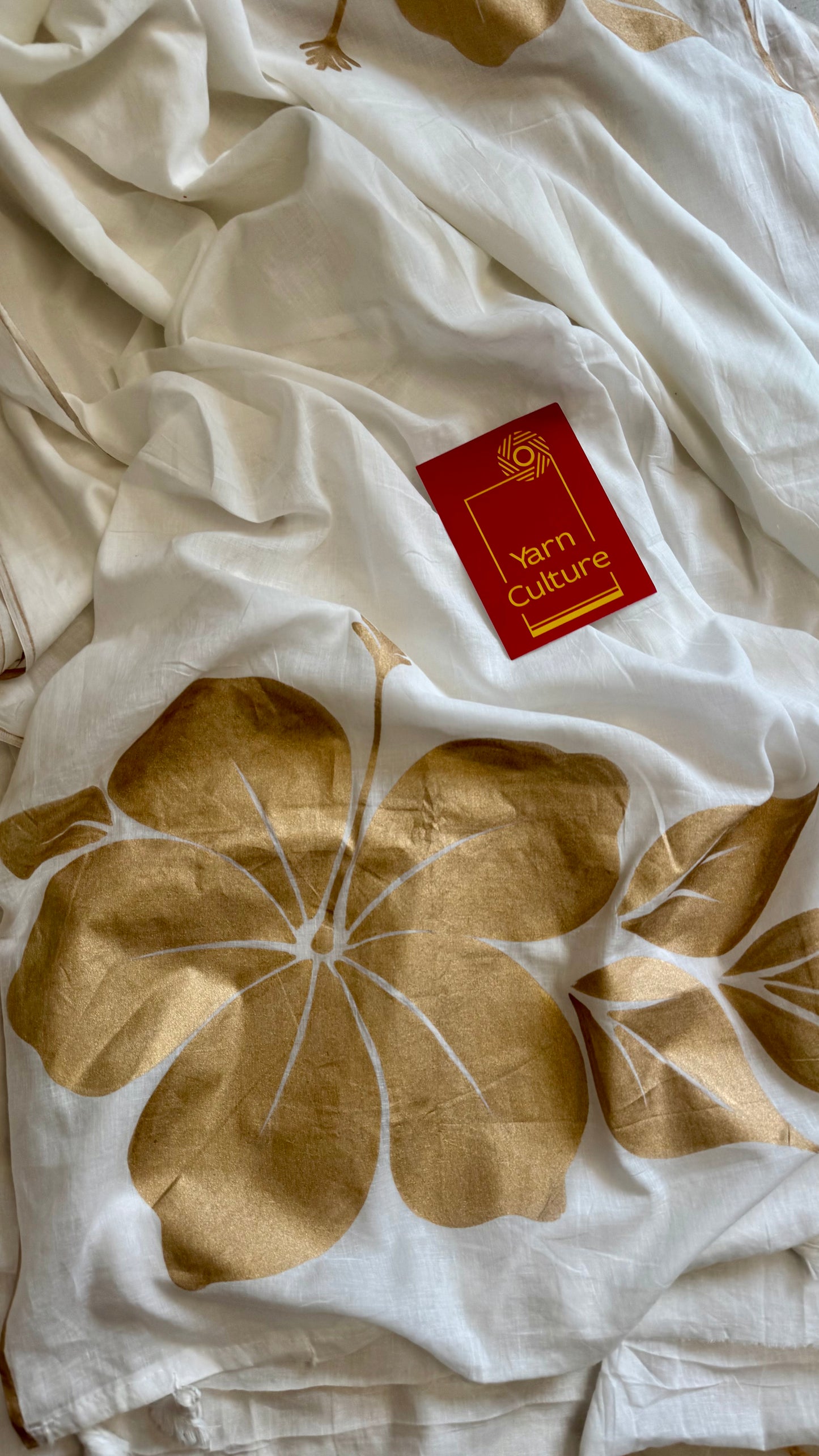 Ivory mul saree, statement floral painted pallu - YCIEON35