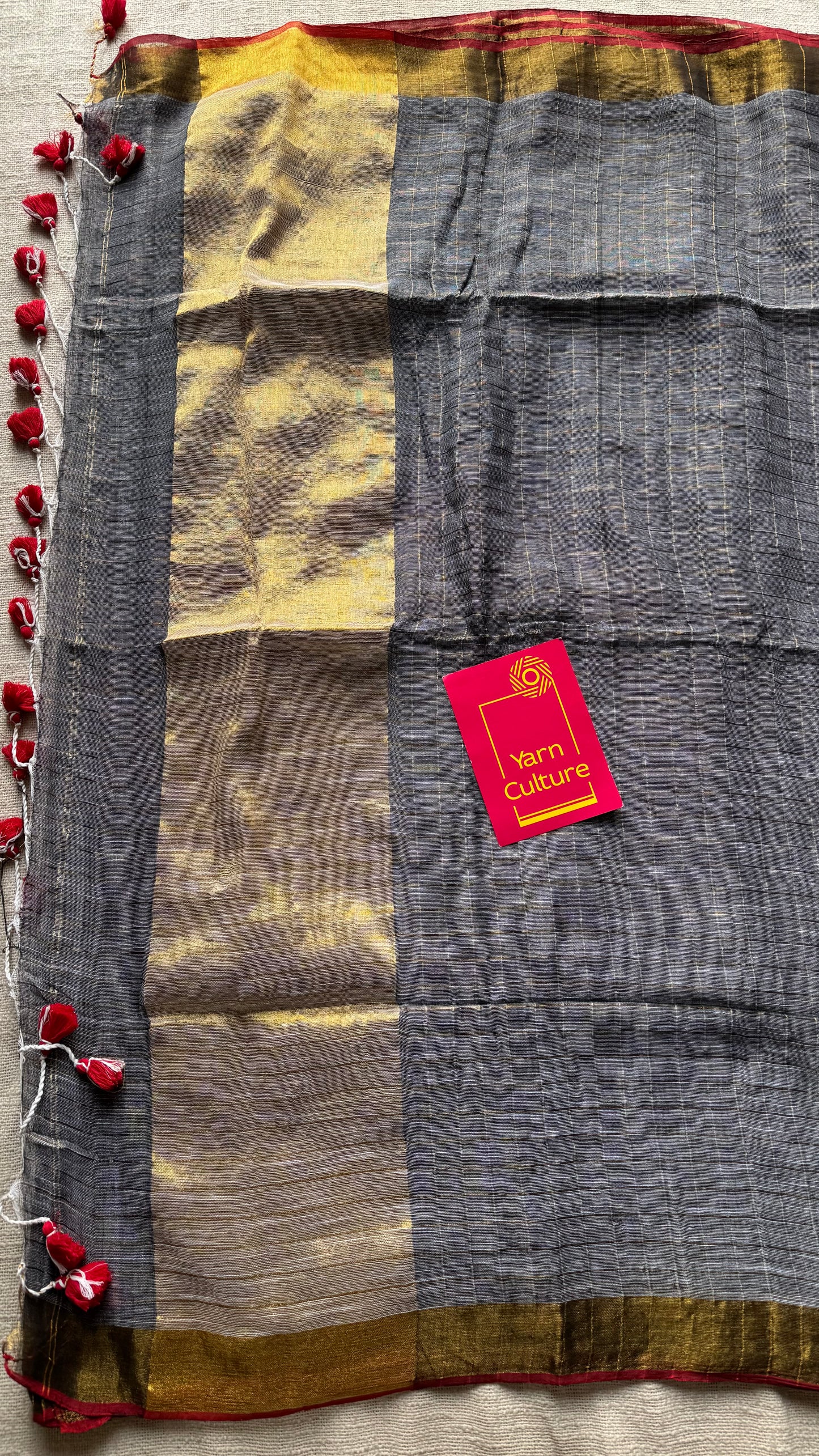Grey linen by cotton saree, gold checks & gold zari pallu - YCBCLCFE388