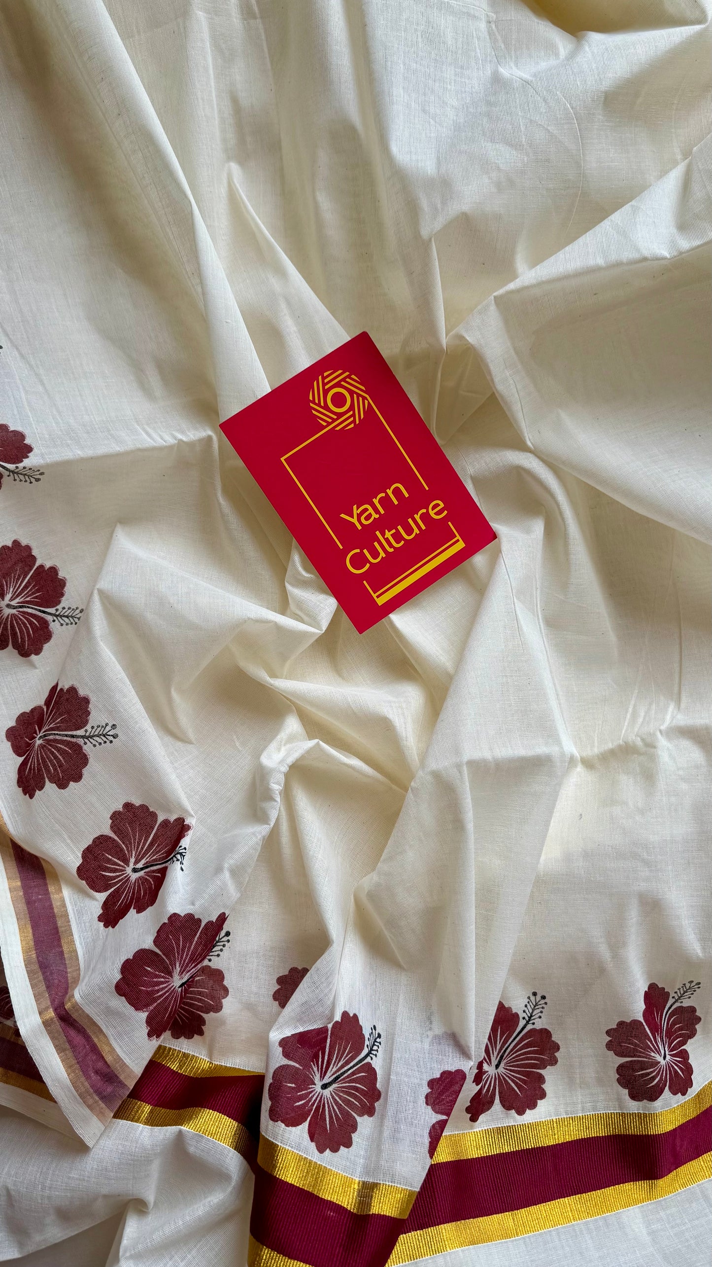 Ivory and gold soft cotton saree, maroon hibiscus (chembarathi) flowers - YCIEON62