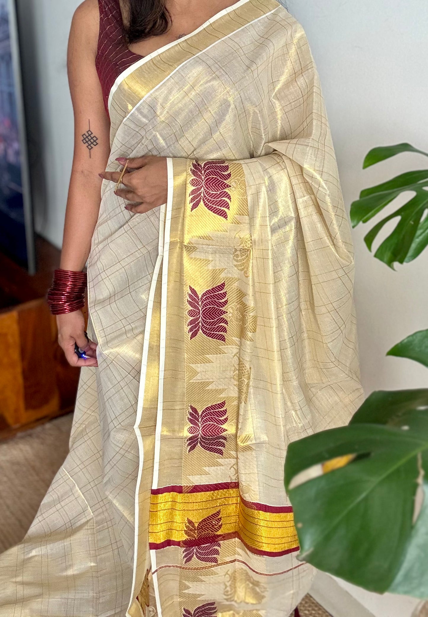 Ivory and gold kerala kasavu saree, maroon lotus motif border - YCIEON48