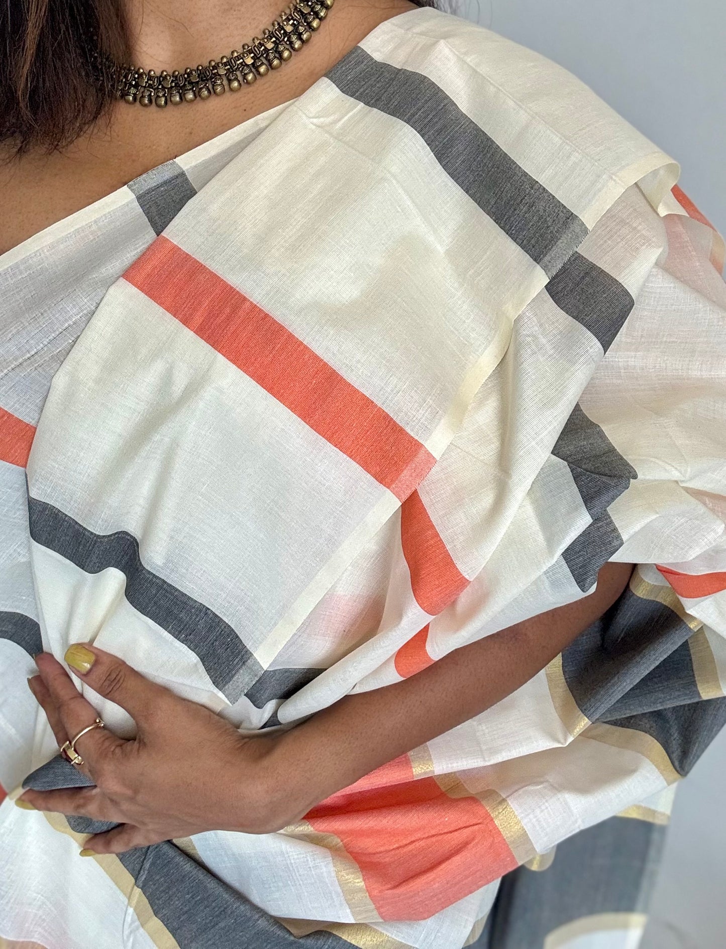 Ivory Kerala cotton saree with peach and dark grey stripes - YCIEKCFE305