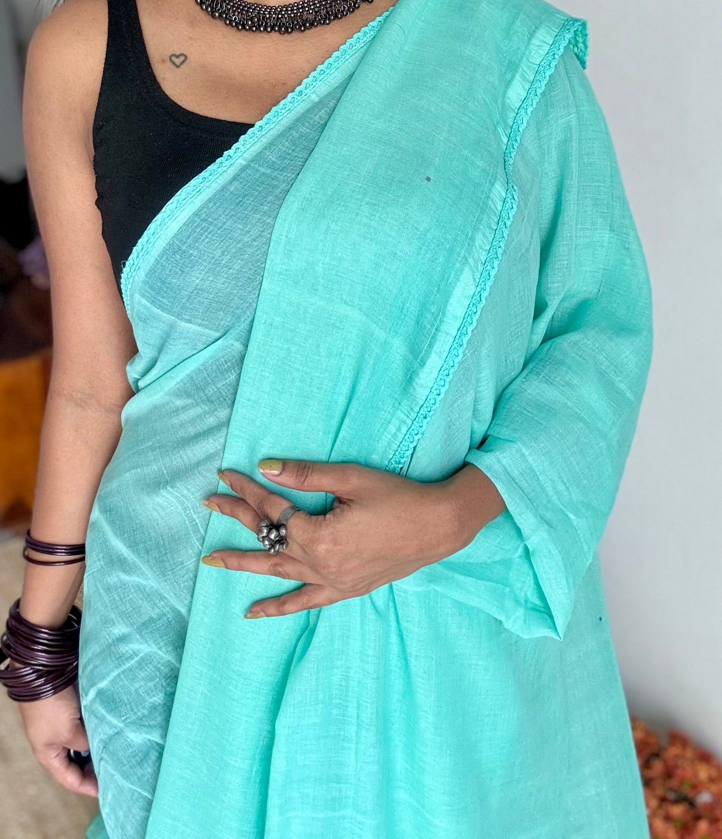 Turquoise plain mul saree with lace border - YCBCMCFE403