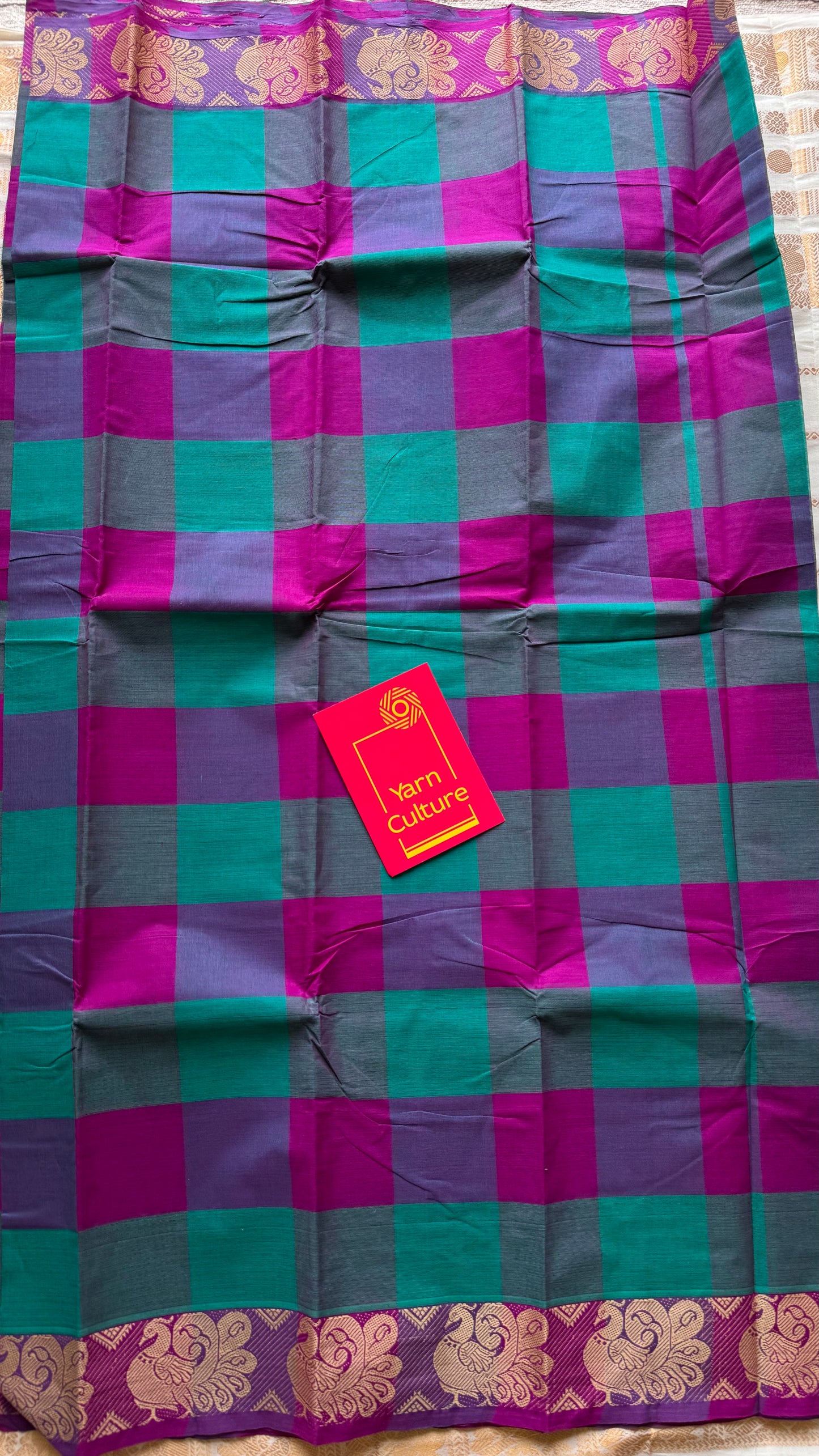 Chettinad cotton saree with magenta and cyan checks, peacock motif border - YCCOTNJUCC03