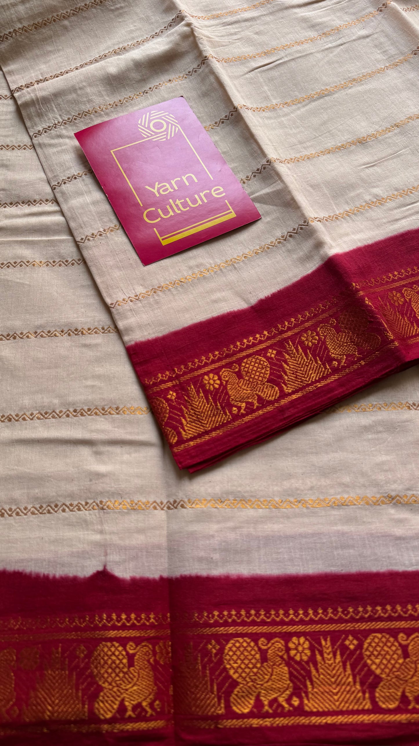 Cream velthaari patterned kattuchayam dyed madurai cotton saree with red peacock border - YCCOTNMSFE277