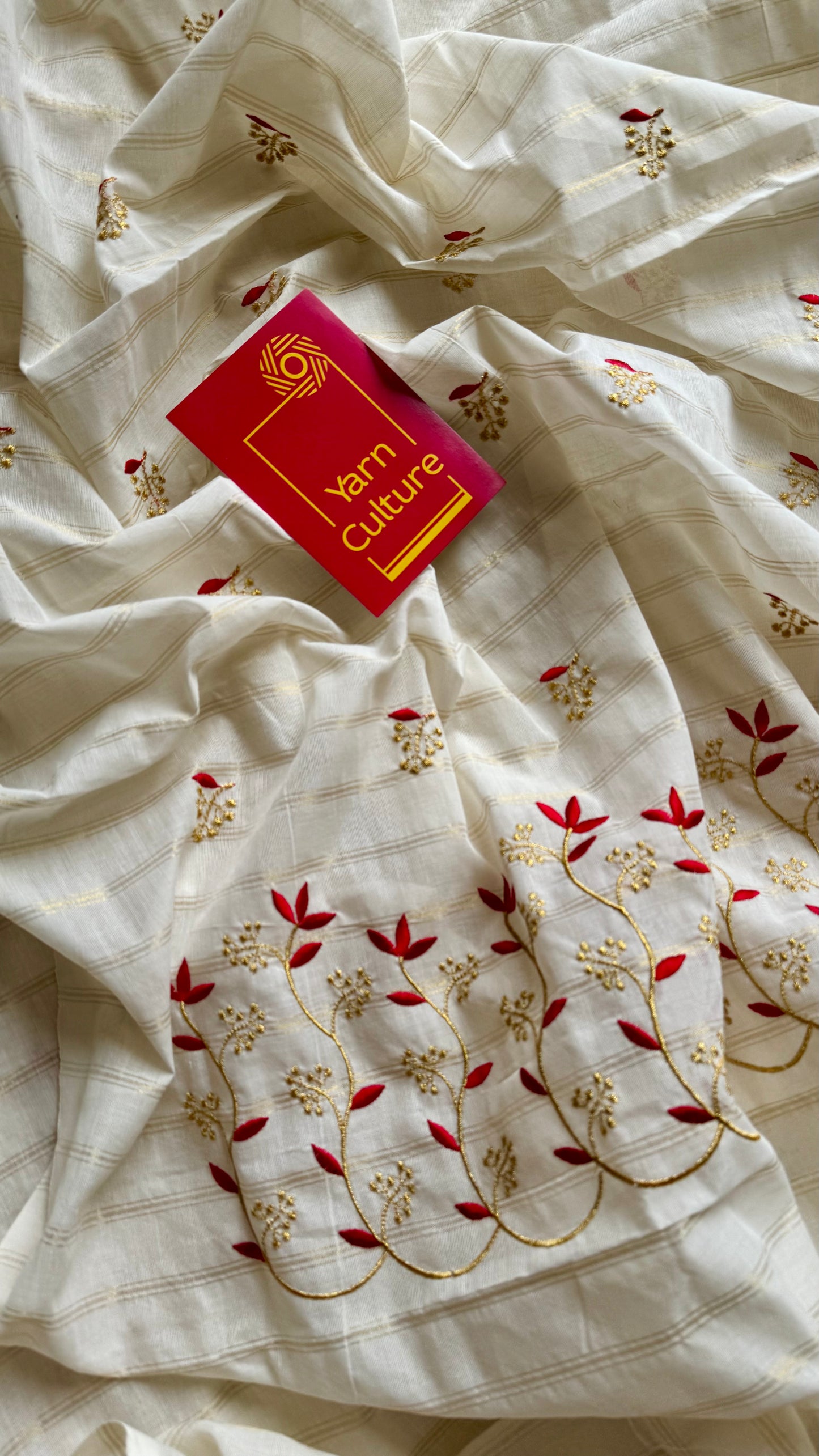 Ivory and gold soft cotton saree, red floral vine embroidery - YCIEON60