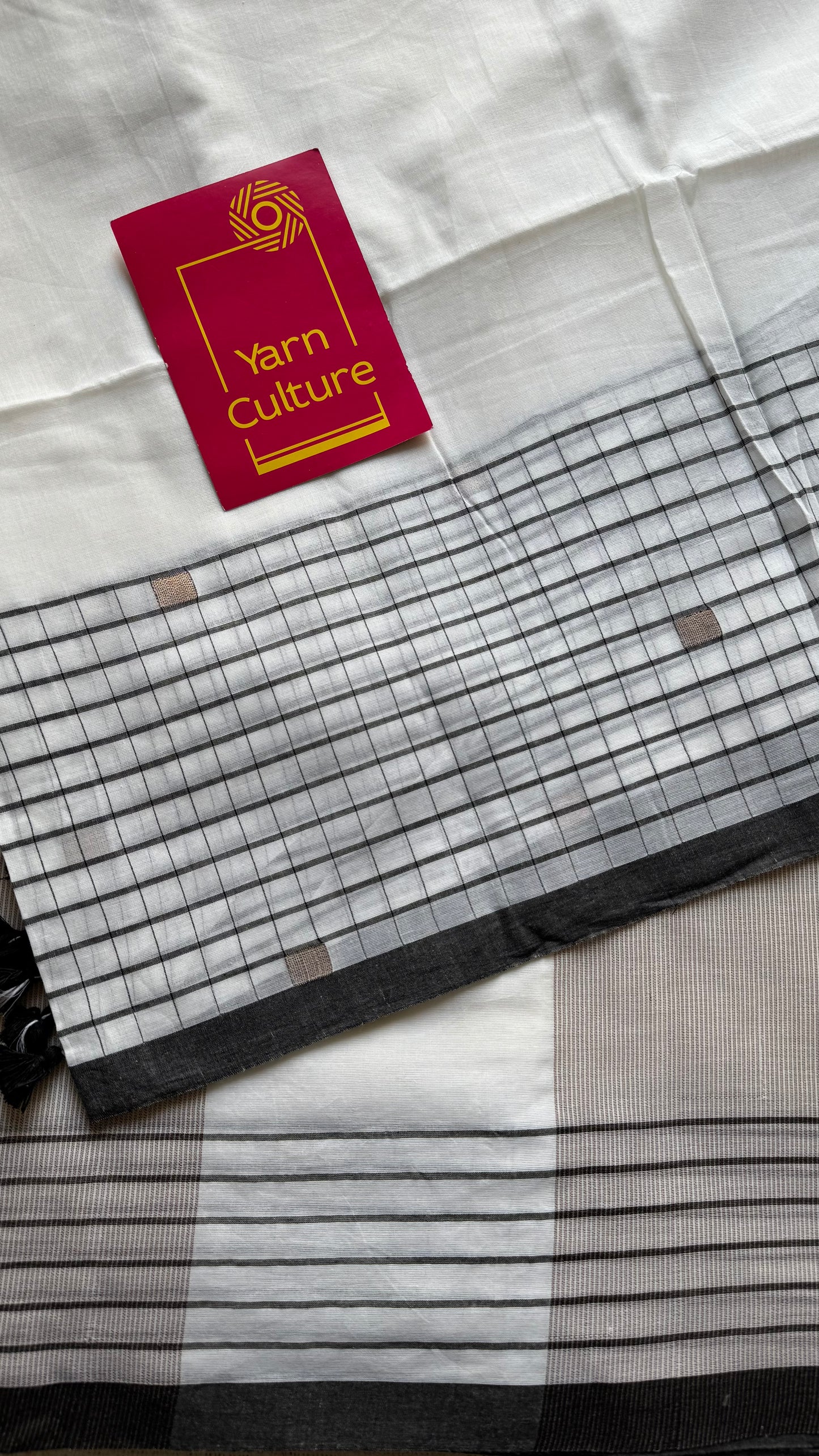 Ivory handloom mul saree with black checkered borders and antique gold buttas - YCBCMCFE170