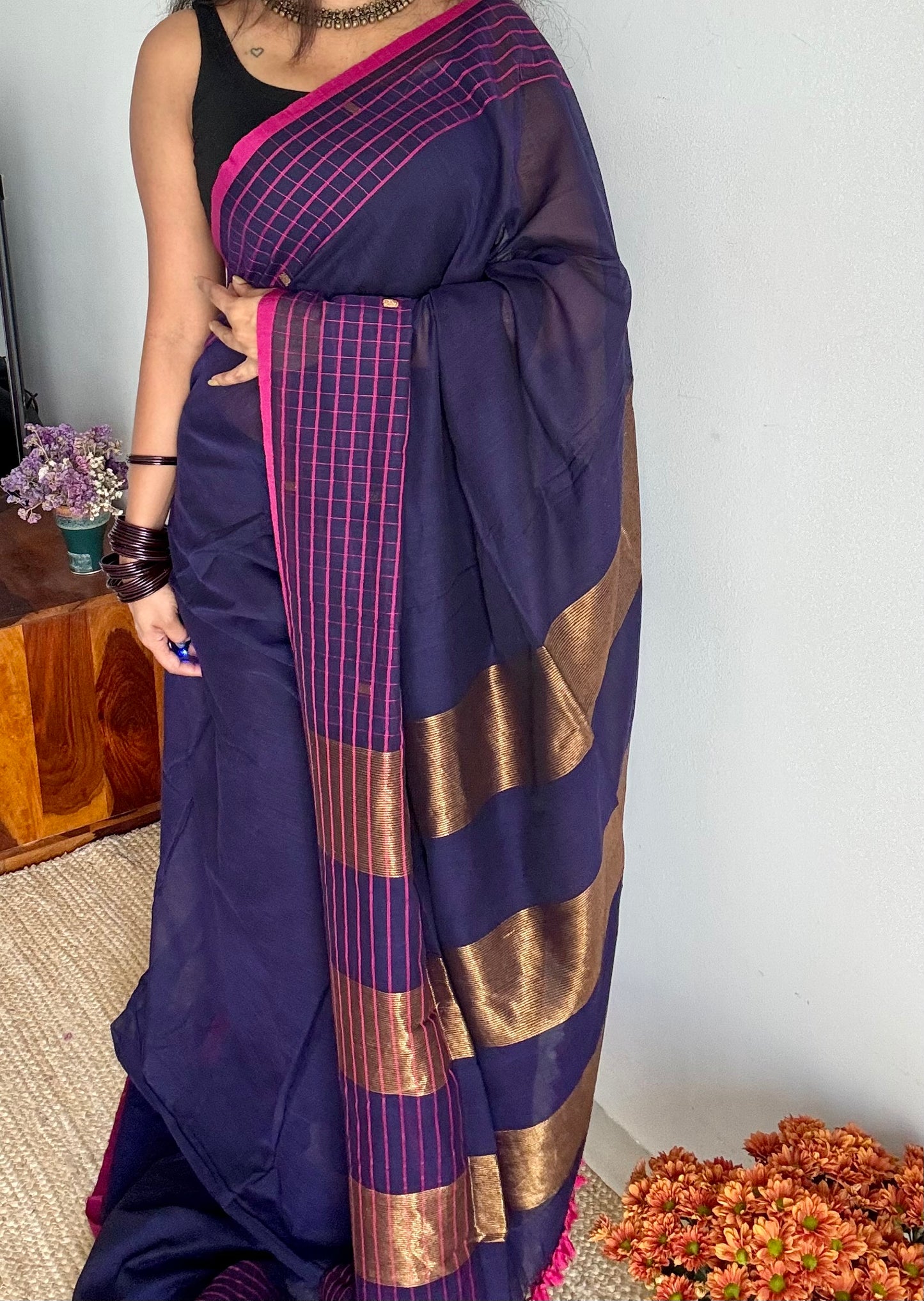 Navy handloom mul saree with hot pink checkered borders and antique gold buttas - YCBCMCFE386