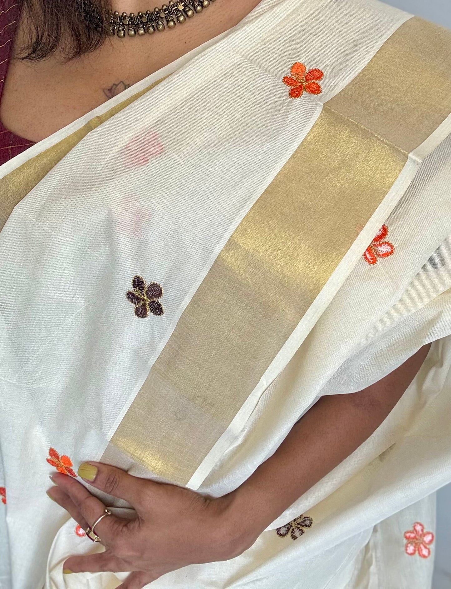 Ivory and gold saree with brown and orange floral embroidery - YCIEKCFE311