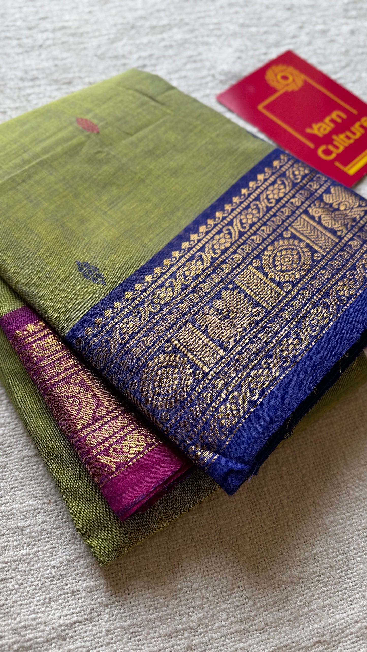 Green with magenta pink and royal blue contrast, kanchi cotton saree - YCCOTNMA326