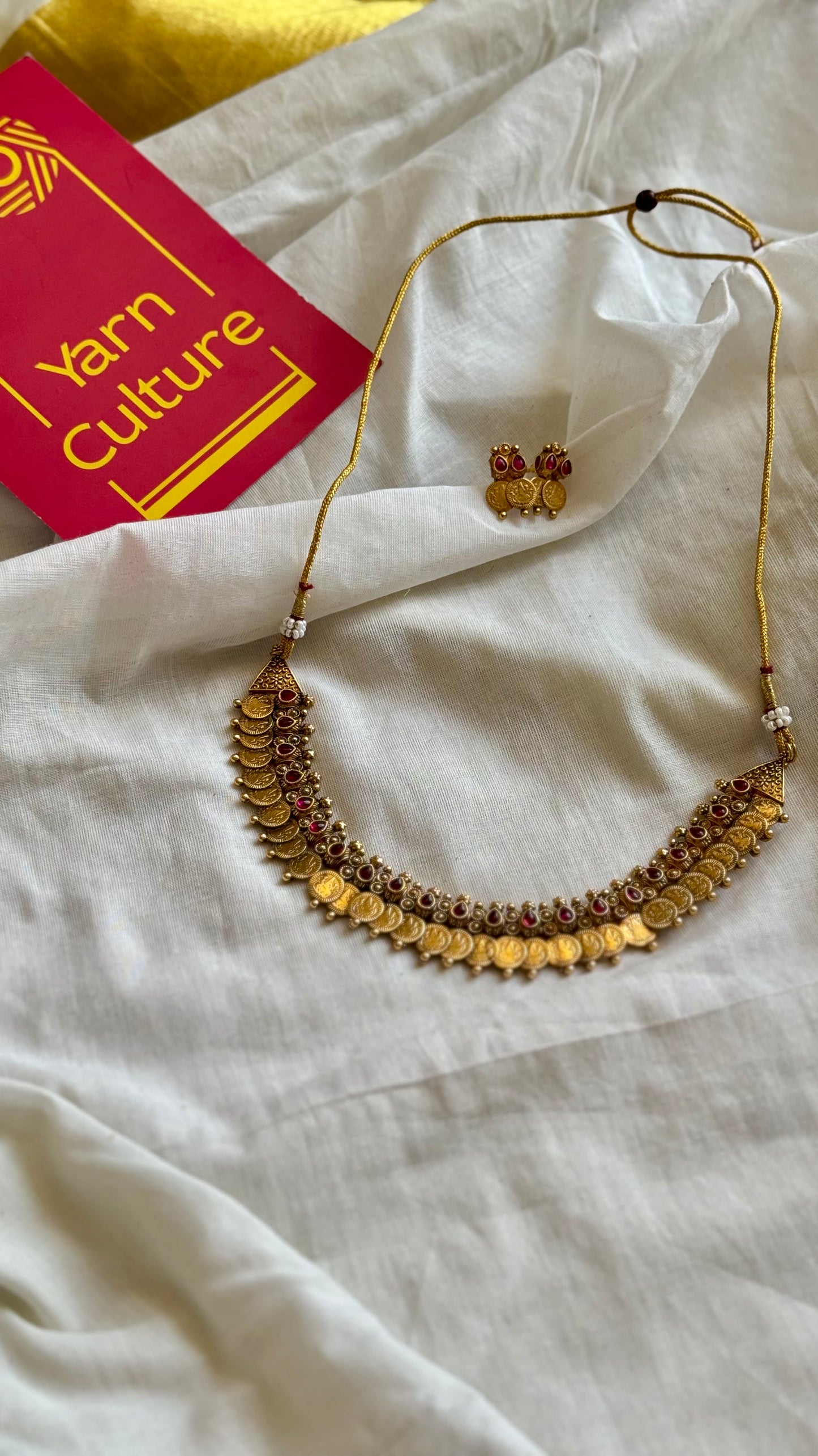 Coin with red stones in drop shape, neckpiece with earrings - YCGPNP671