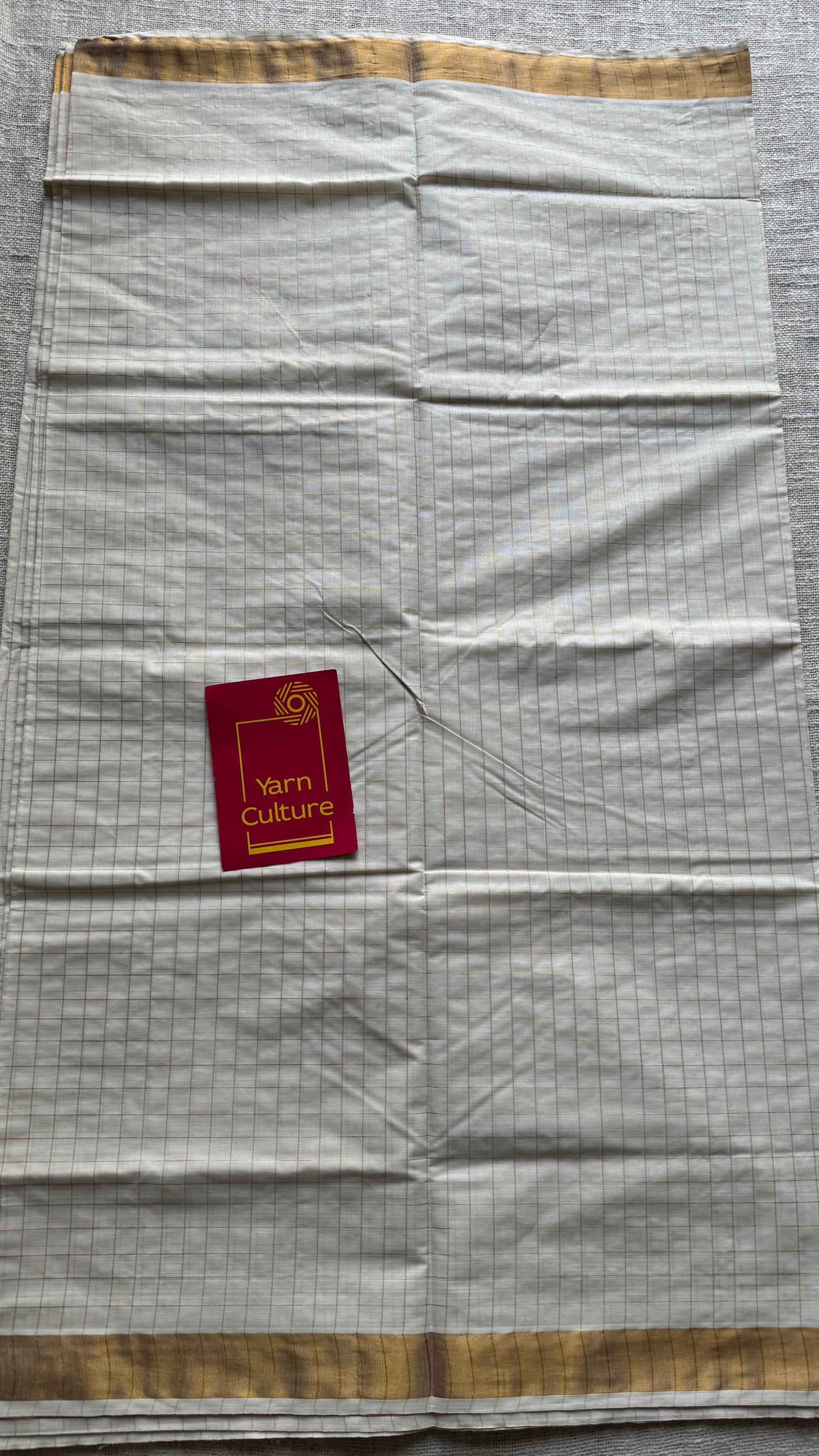 Ivory Kerala cotton saree with gold checks - YCIEKCFE318