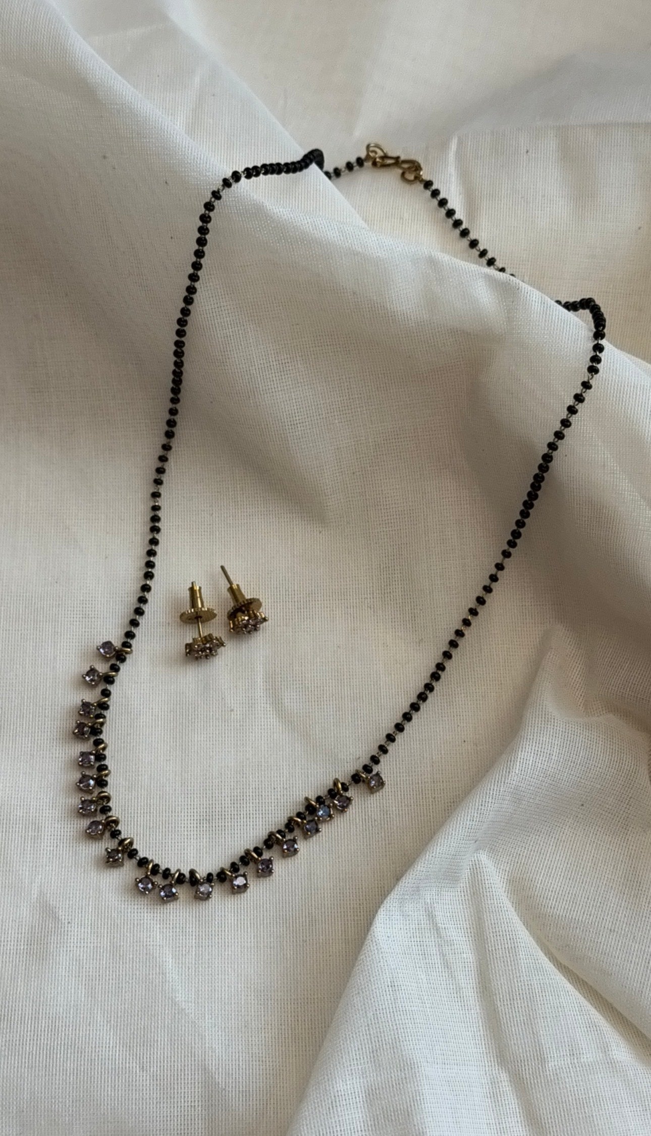 Black beaded (karimani) neckchain with lilac stone pendants, with earrings - YCGPNP810