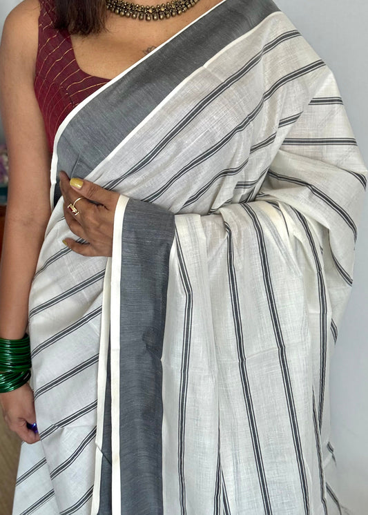 Ivory Kerala cotton saree with black stripes and border - YCIEKCFE321