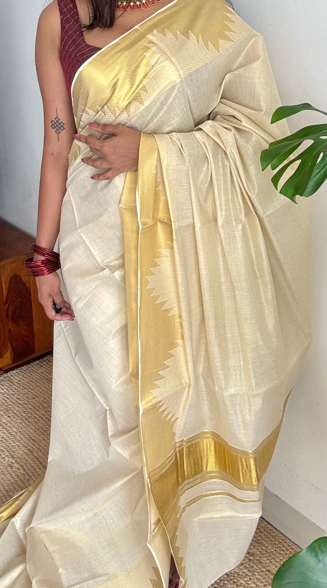 Ivory and gold soft tissue cotton saree, temple motif border - YCIEON81