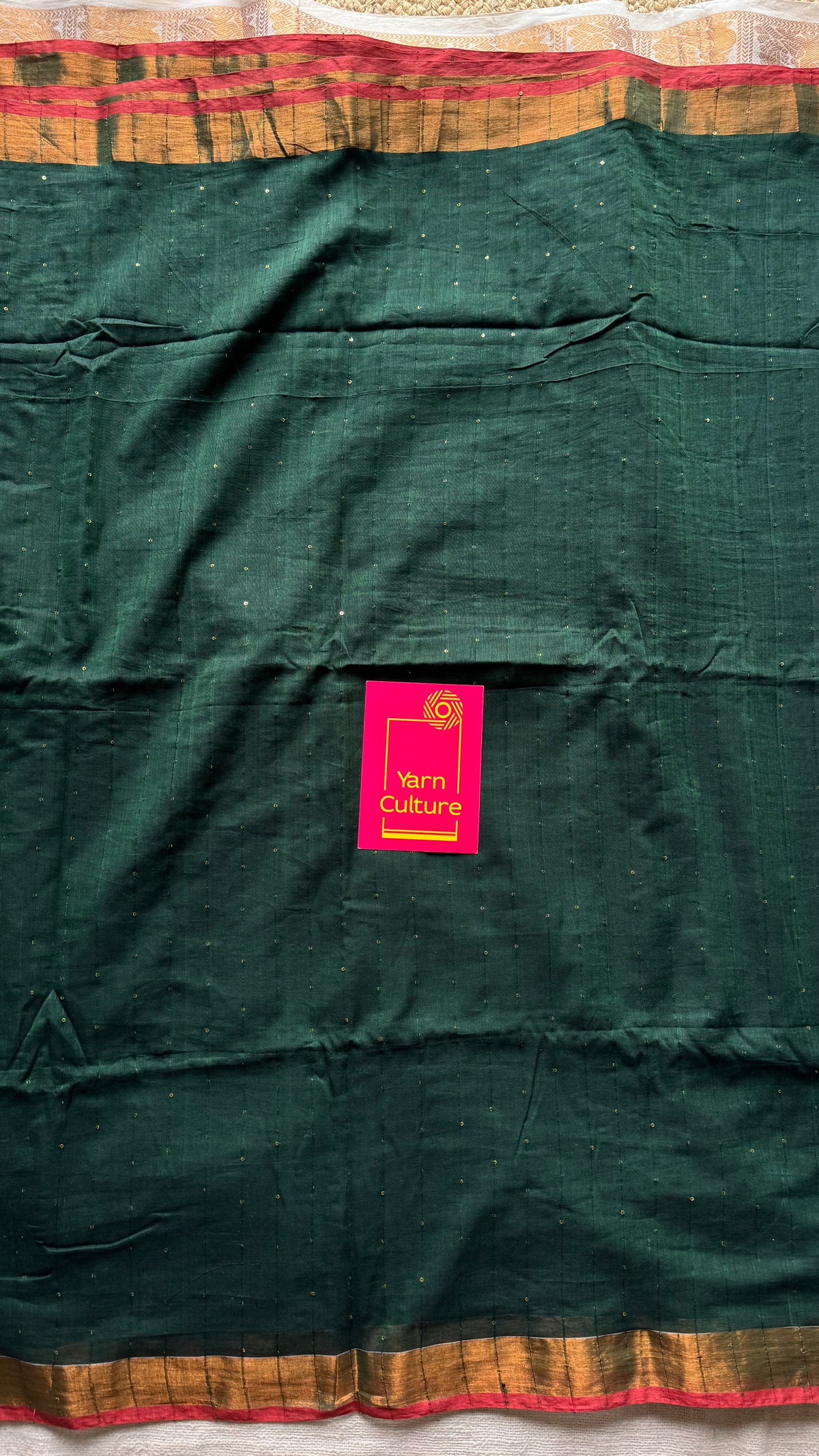 Dark green mul cotton saree with sequins and zari border - YCBCMCSE32