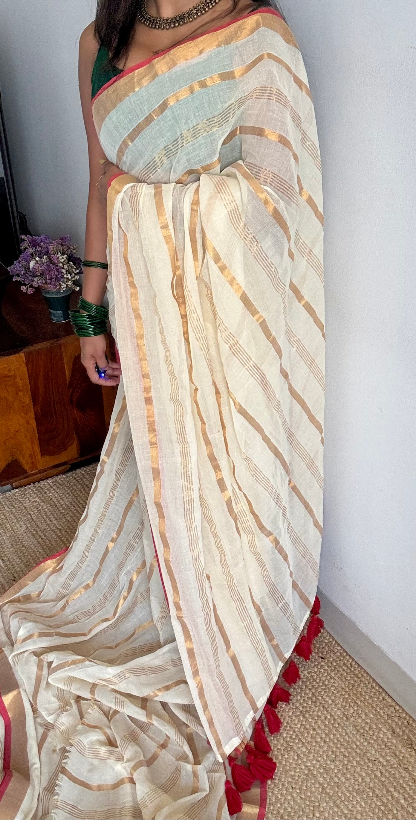 Ivory mul saree with gold stripes and red border - YCIEBCFE327