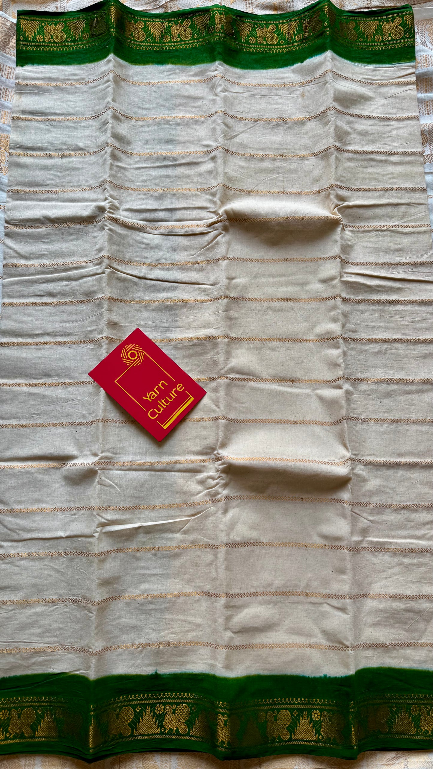 Ivory with green contrast velthaari sungudi, kattuchayam dyed madurai cotton - YCIEON104