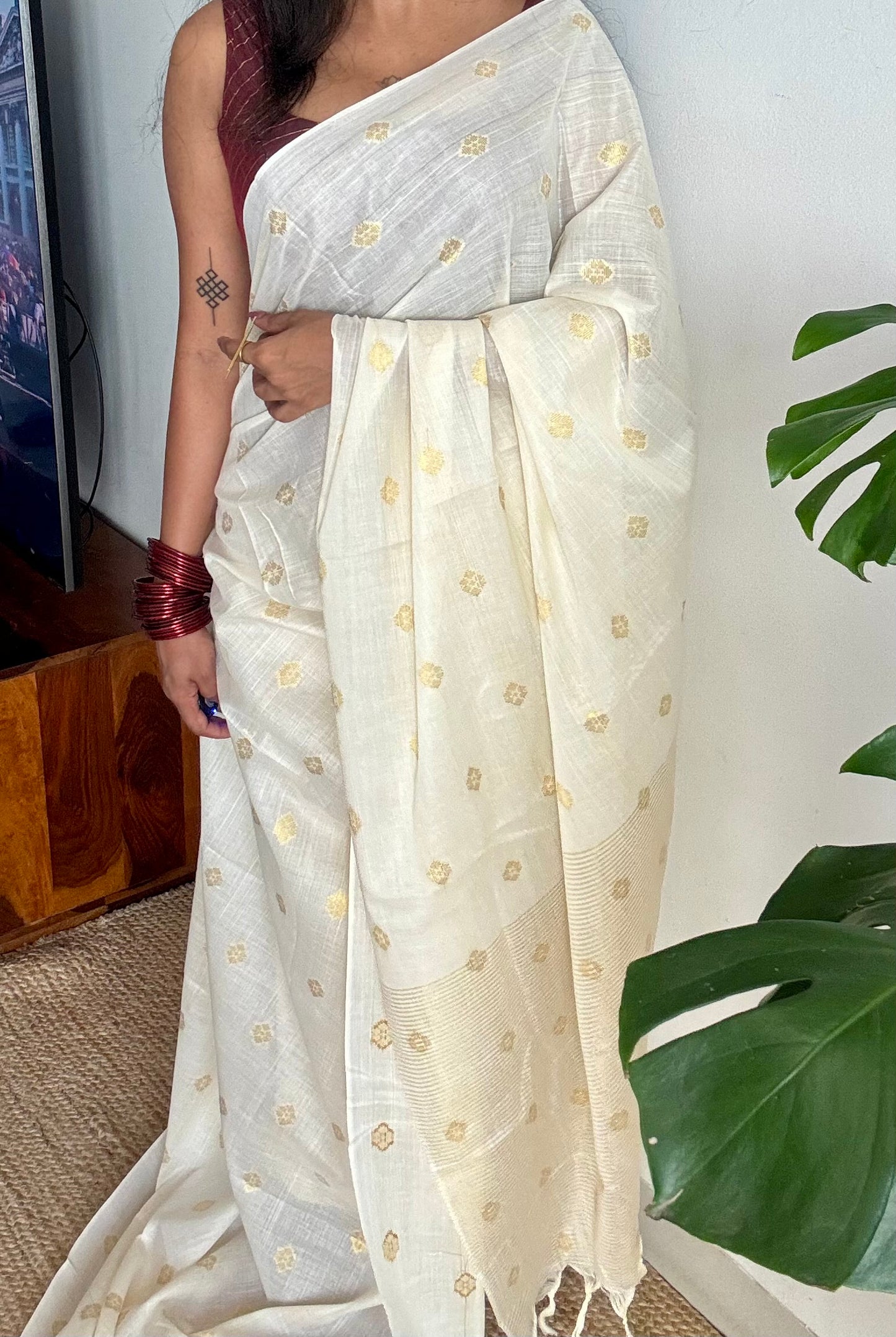 Ivory and gold kerala saree with woven buttas, striped pallu - YCIEON43