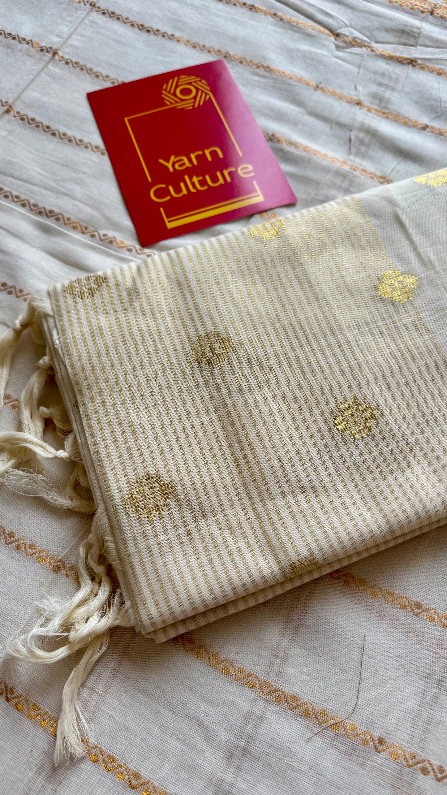 Ivory and gold kerala saree with woven buttas, striped pallu - YCIEON43