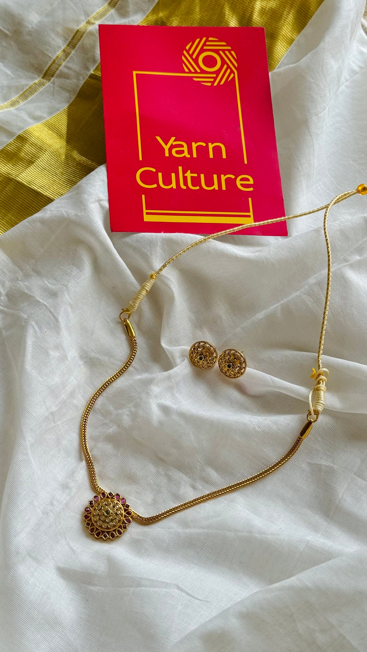 Attigai with ruby, green, white stone pendant, with earrings - YCGPNP741