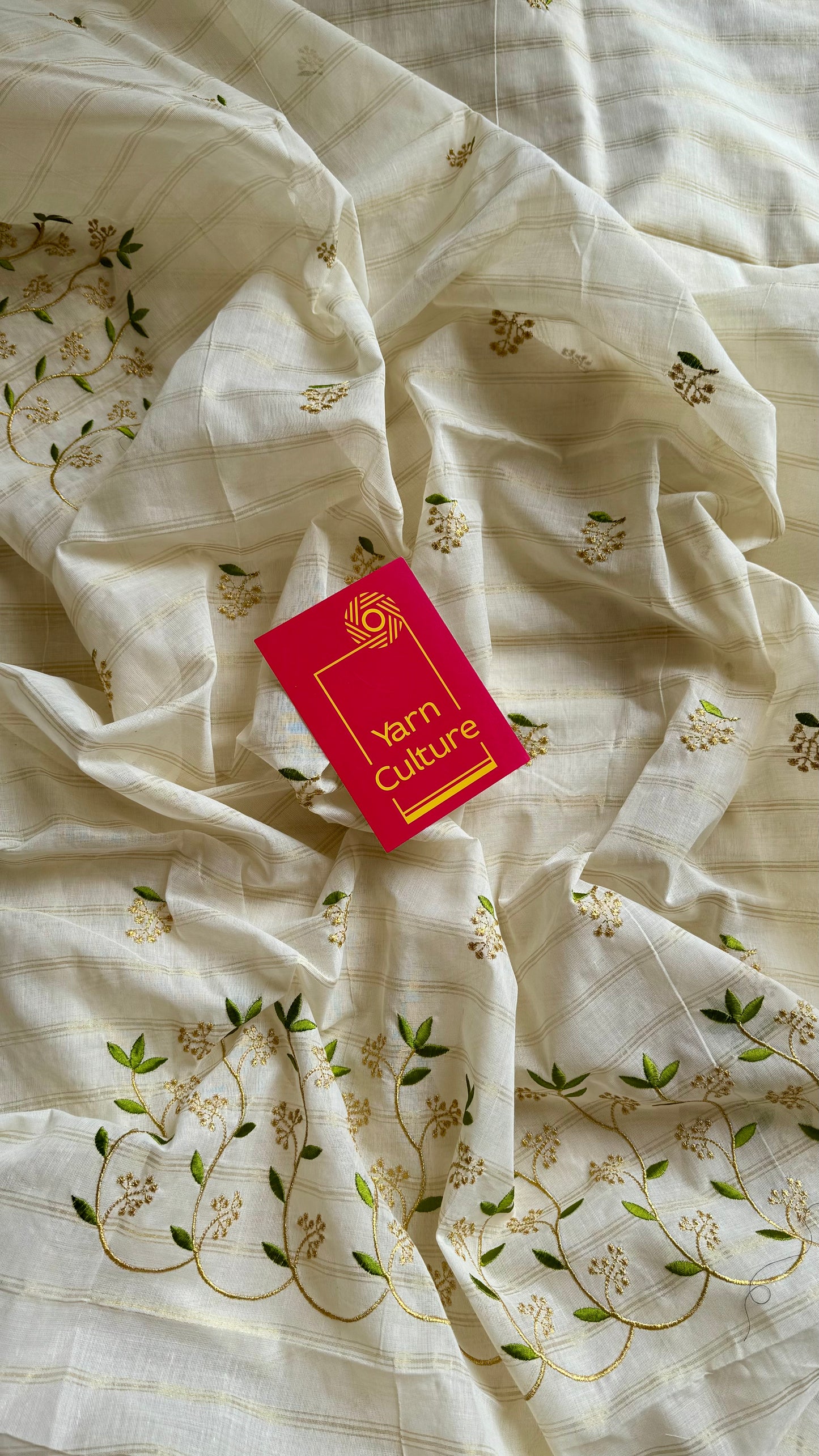 Ivory and gold soft cotton saree, light green floral vine embroidery - YCIEON59