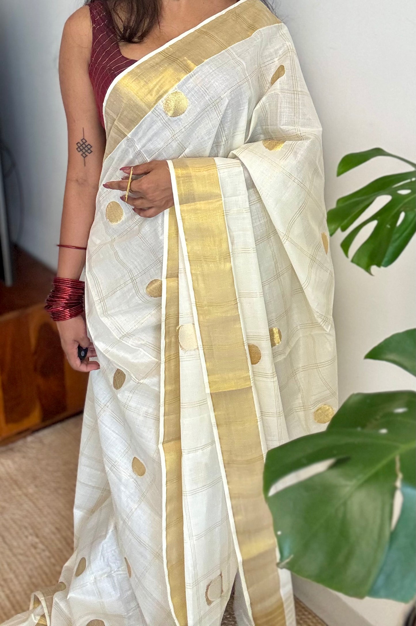 Ivory and gold kerala saree with gold buttas and checks - YCIEON41