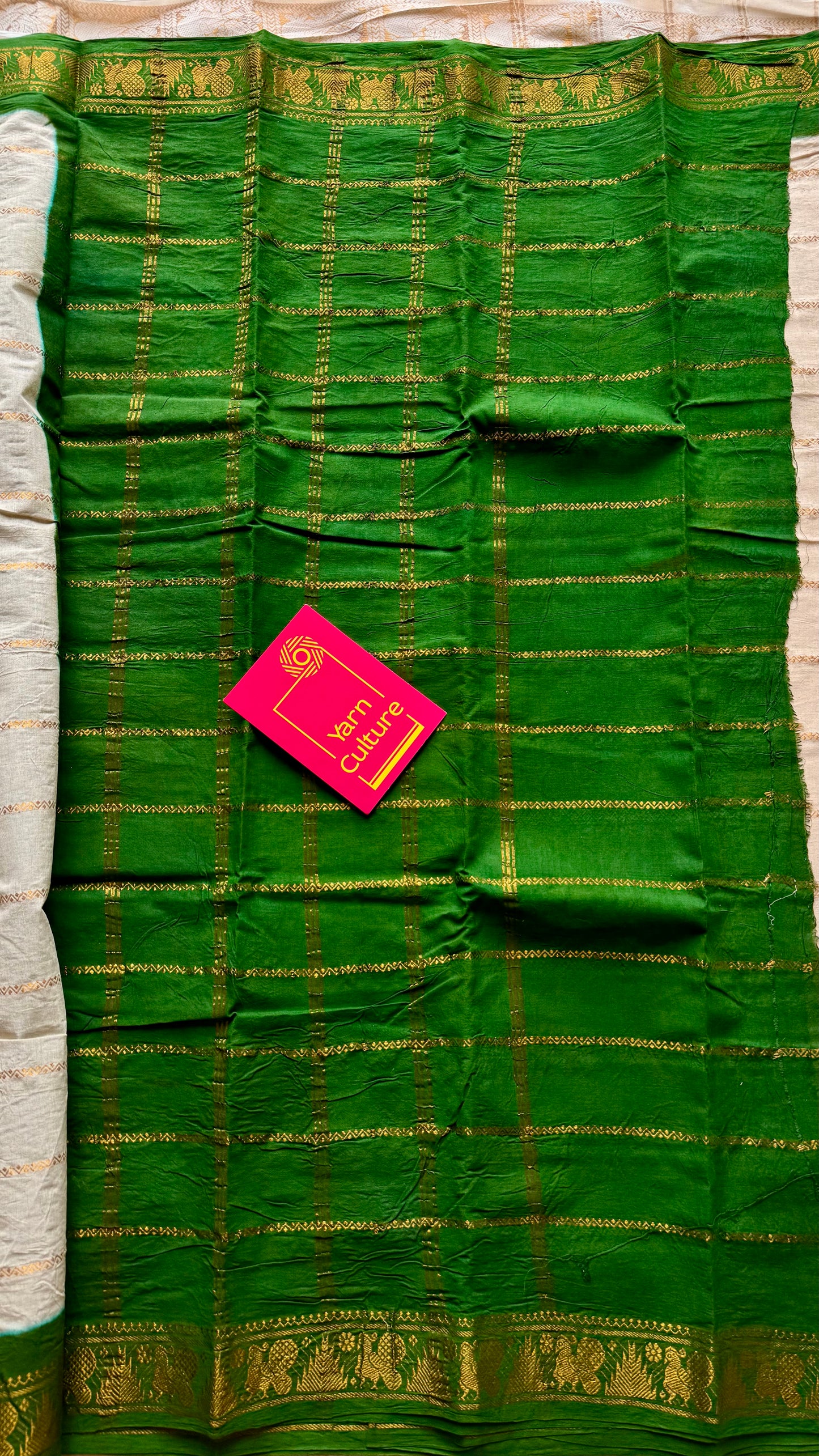 Ivory with green contrast velthaari sungudi, kattuchayam dyed madurai cotton - YCIEON104