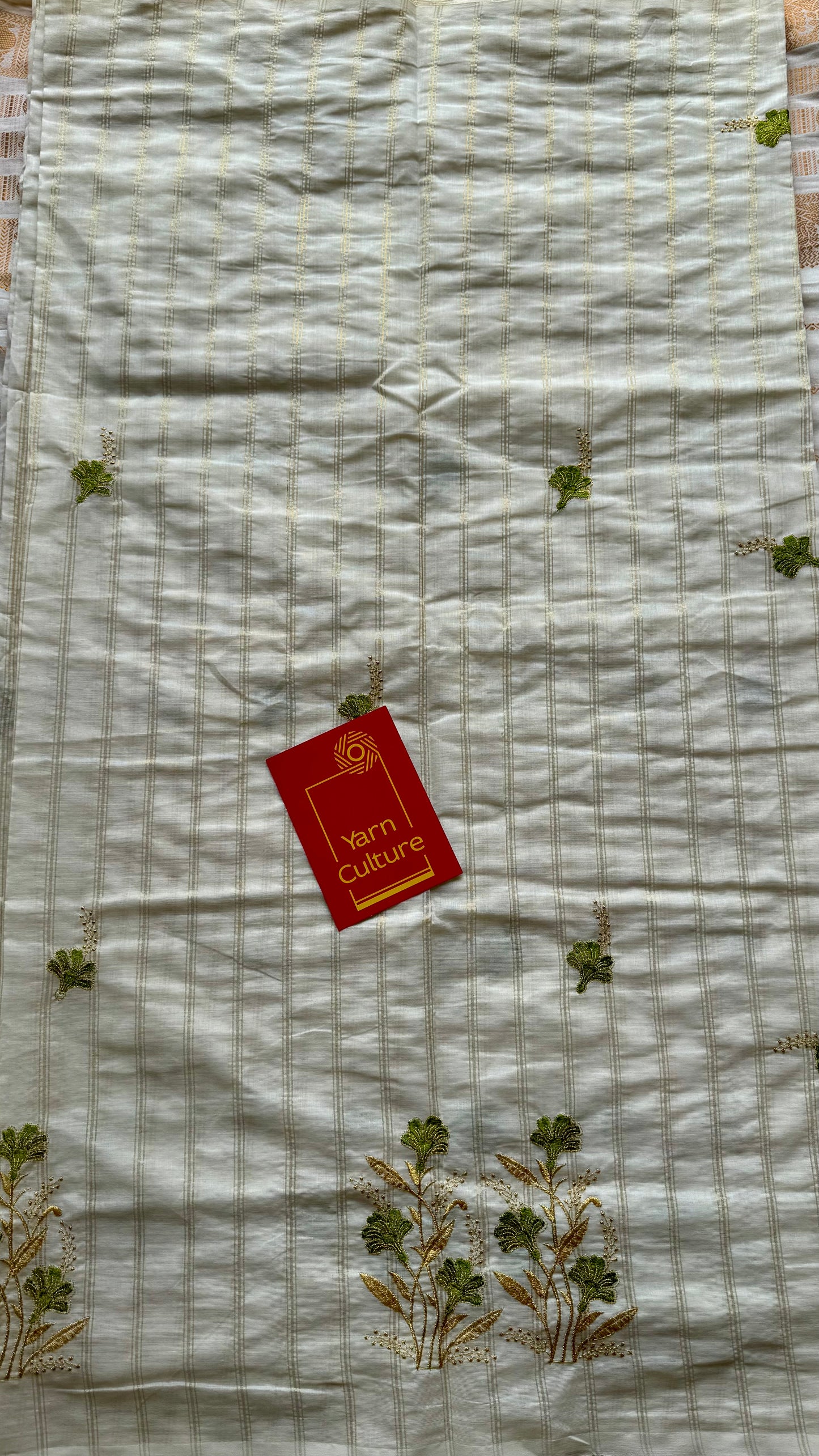 Ivory and gold soft cotton saree, light green floral embroidery  - YCIEON49