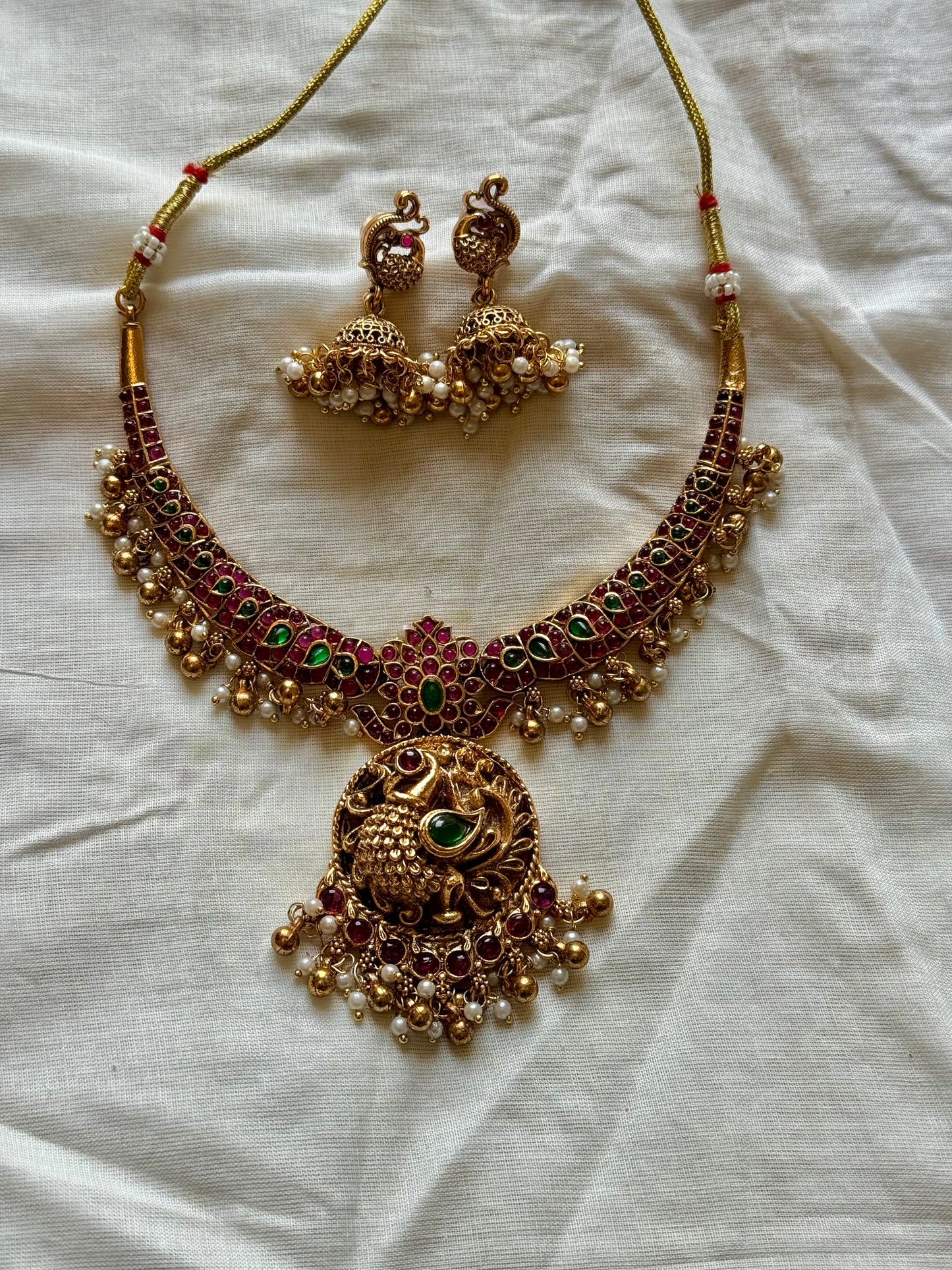 Kemp stones, peacock pendant necklace with jhumkas - YCGPNP469