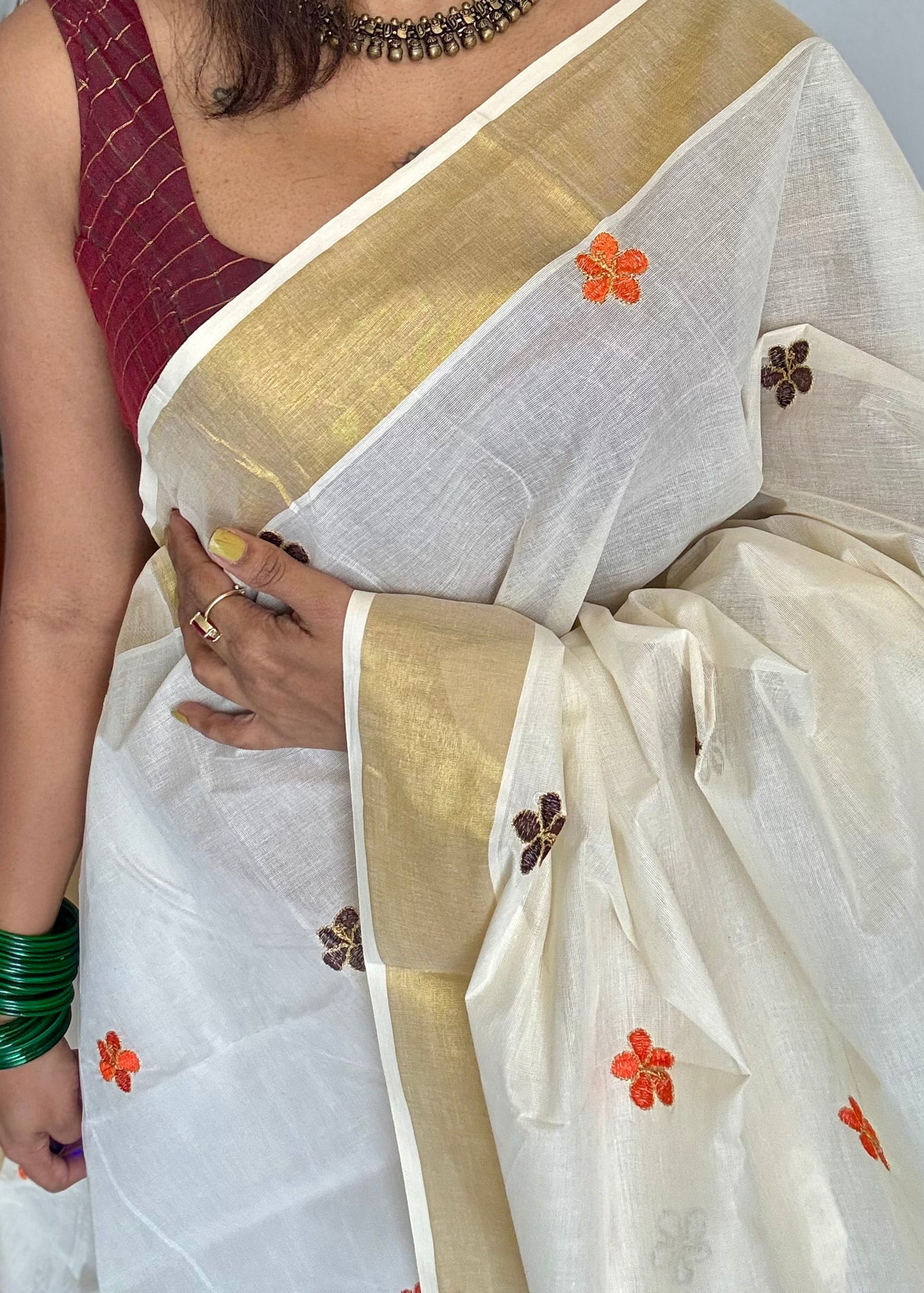 Ivory and gold saree with brown and orange floral embroidery - YCIEKCFE311