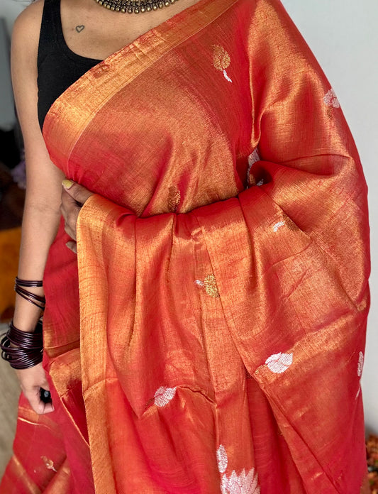 Handwoven orange gold dual tone tissue linen saree with lotus motifs - YCBCLTFE399