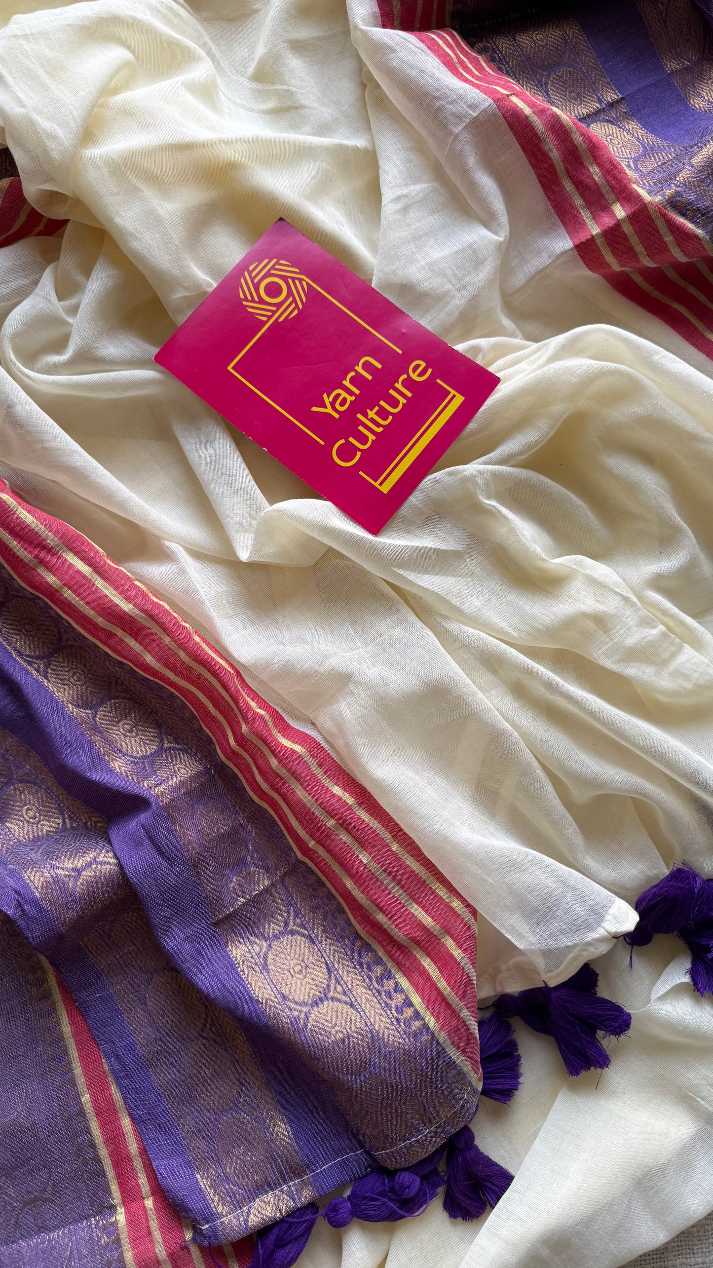 Ivory mul saree with purple and red motif zari border  - YCBCMCFE299