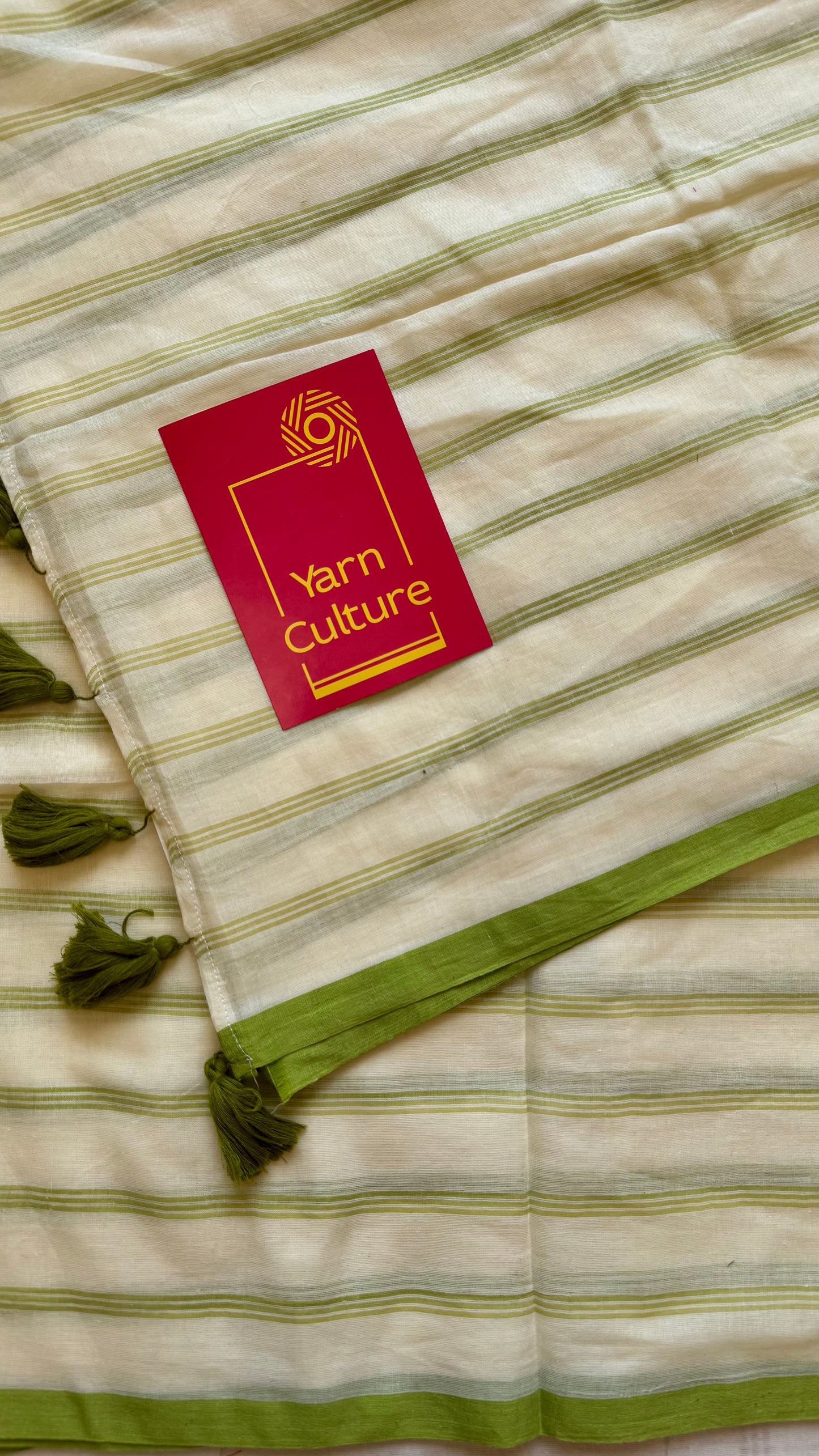 Ivory mul saree, green stripes - YCIEON23